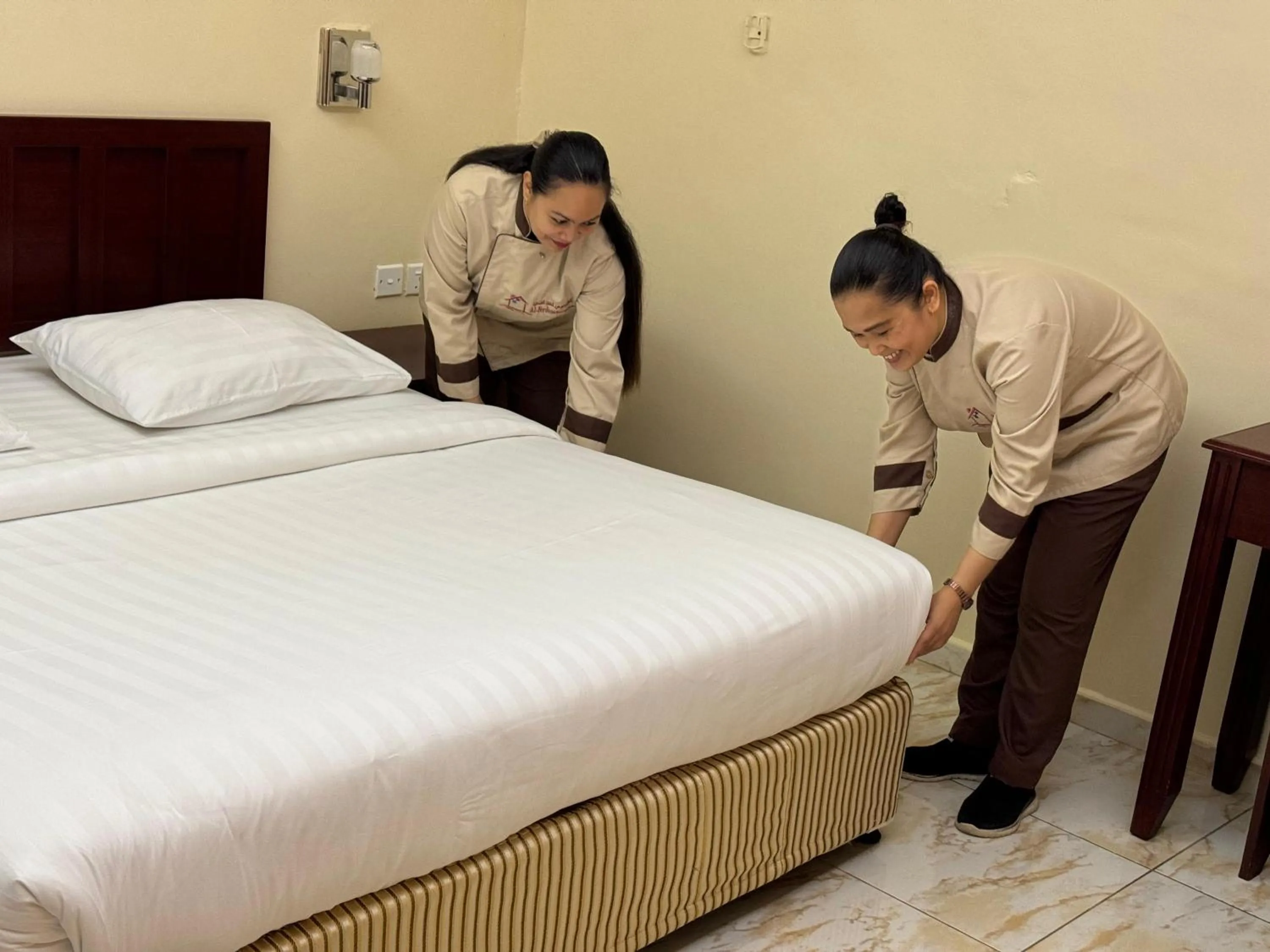 Bed in Al Ferdous Hotel Apartments