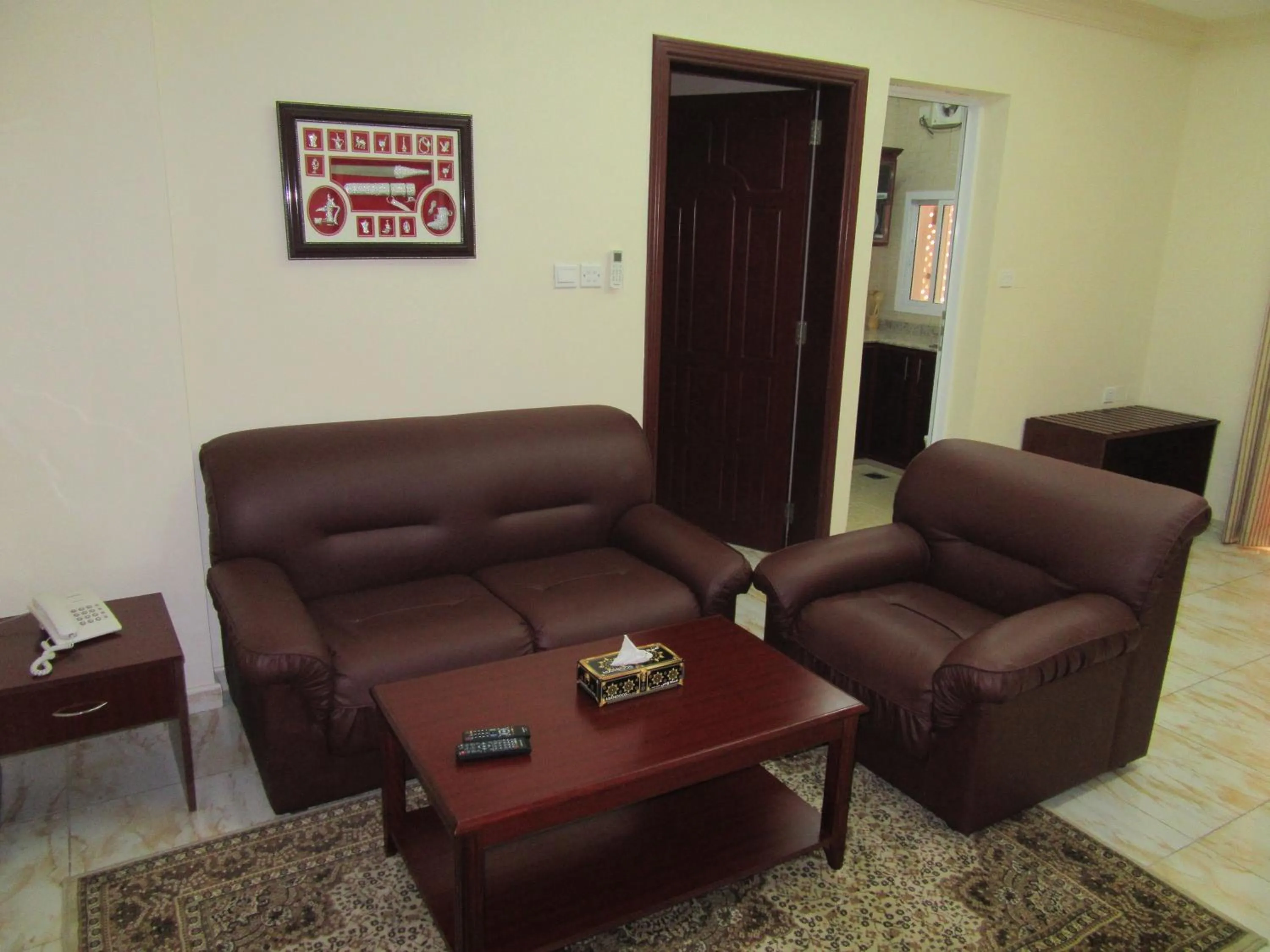 Living room in Al Ferdous Hotel Apartments