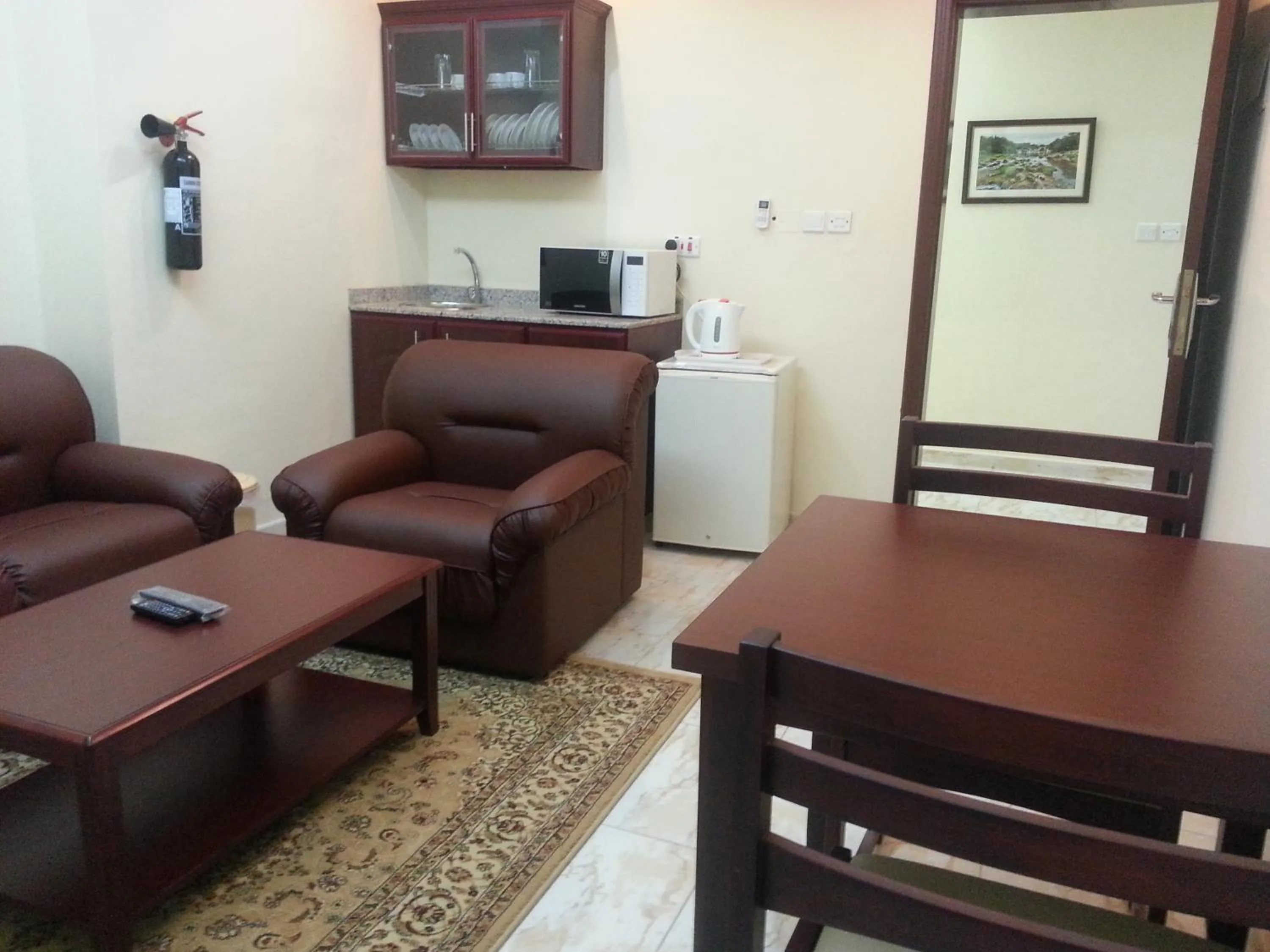 Living room in Al Ferdous Hotel Apartments