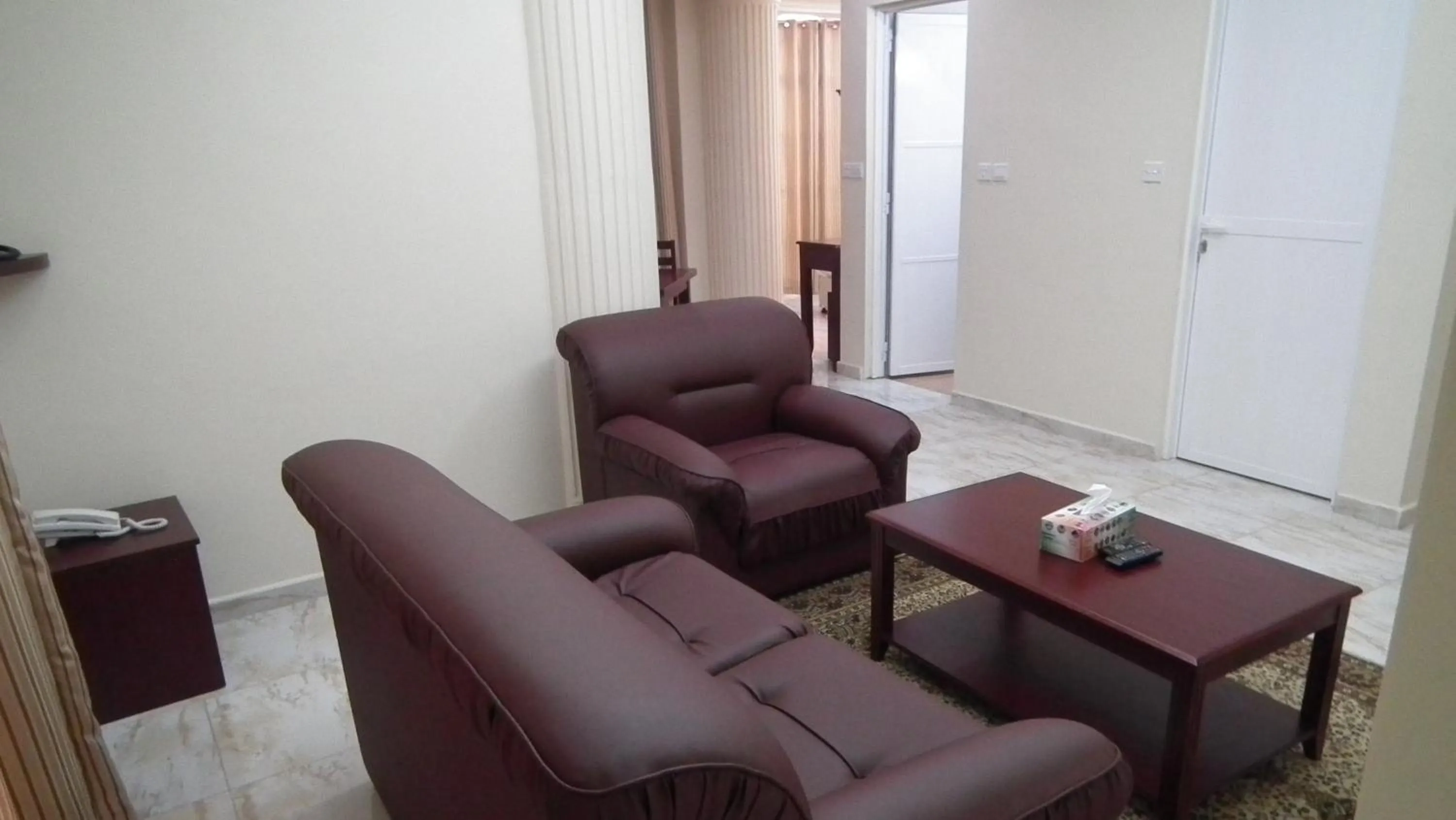 Living room in Al Ferdous Hotel Apartments
