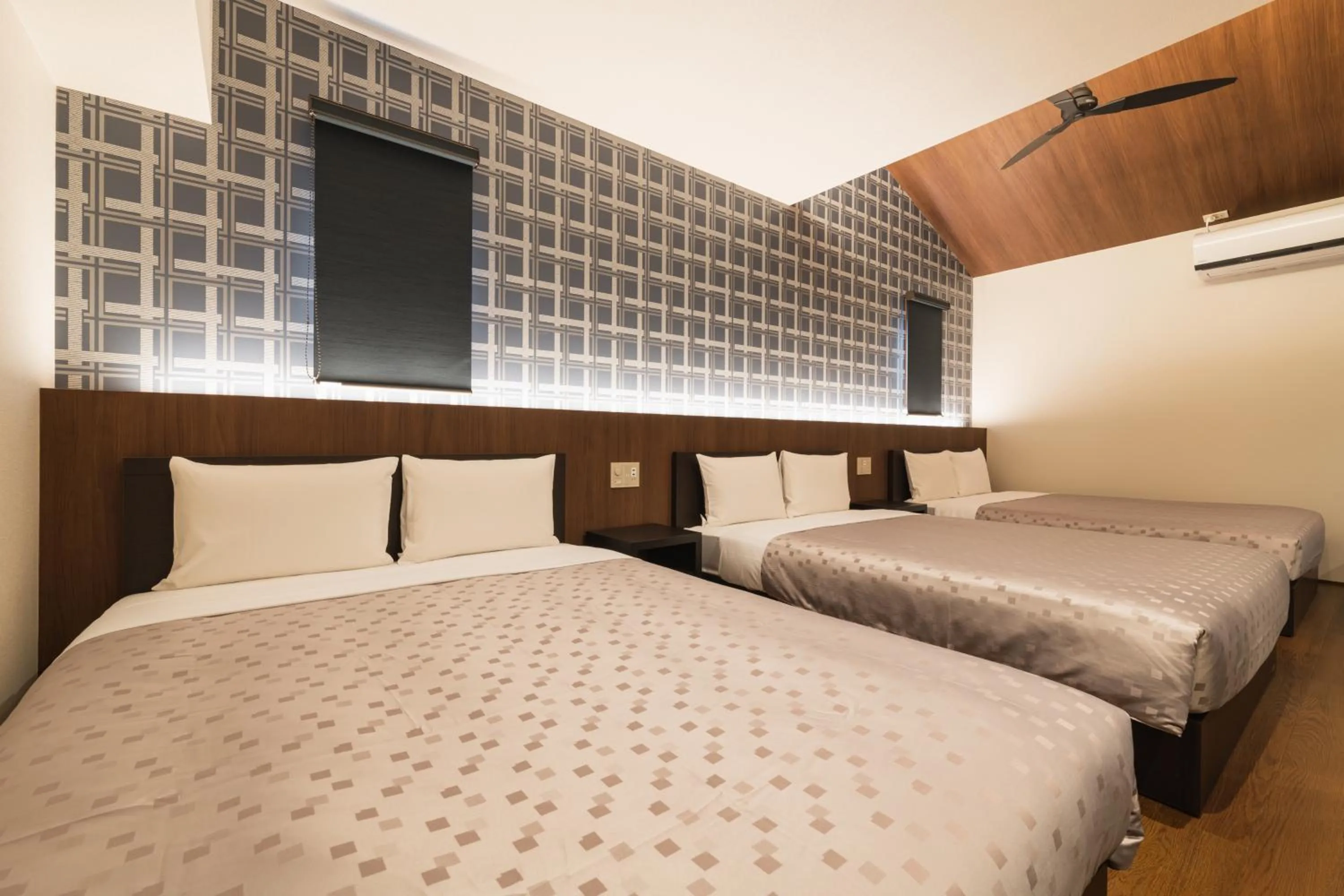 Bed in GRAND BASE Hakata Gofuku