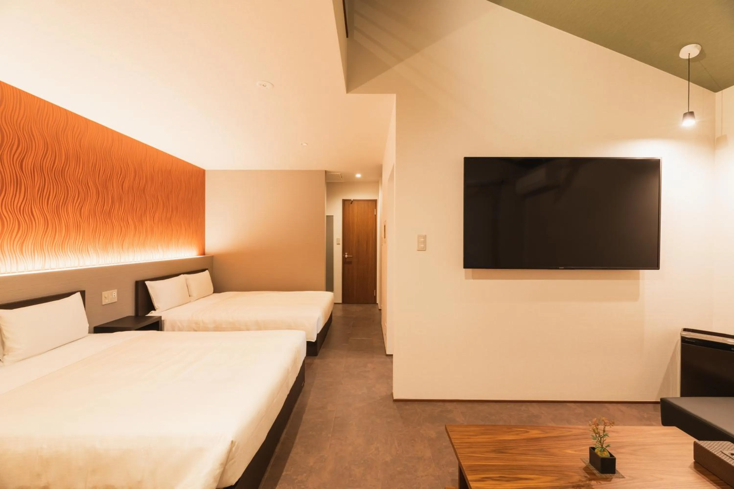 Photo of the whole room, Bed in GRAND BASE Hakata Gofuku