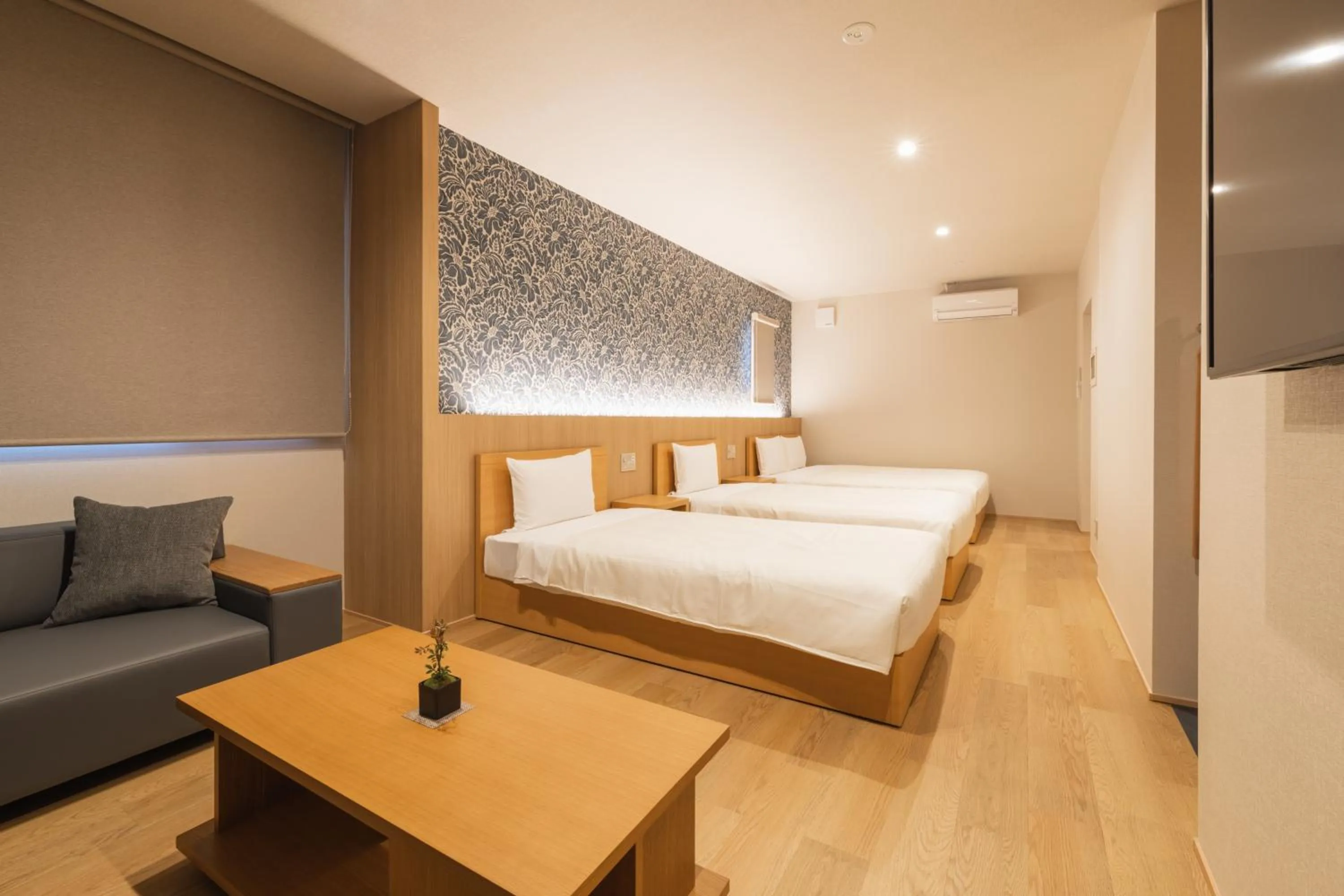 Photo of the whole room, Bed in GRAND BASE Hakata Gofuku