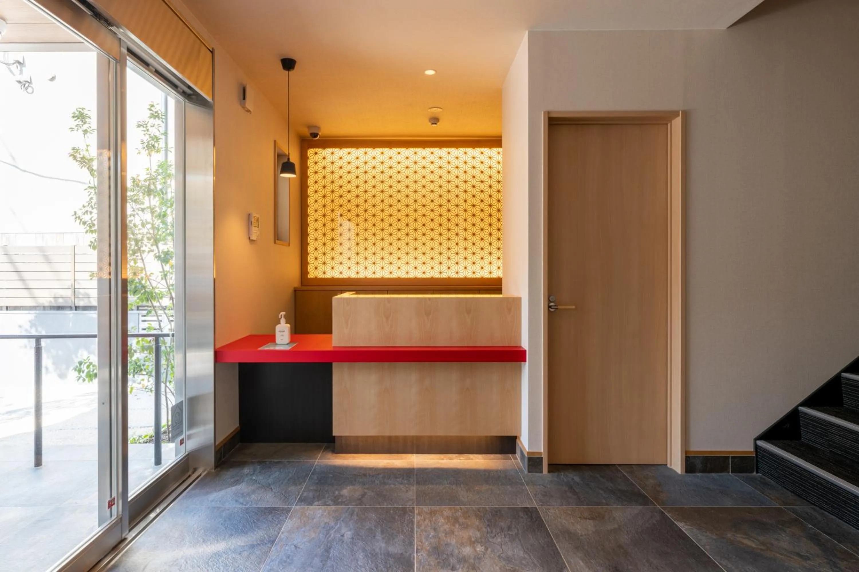 Lobby or reception, Bed in GRAND BASE Hakata Gofuku