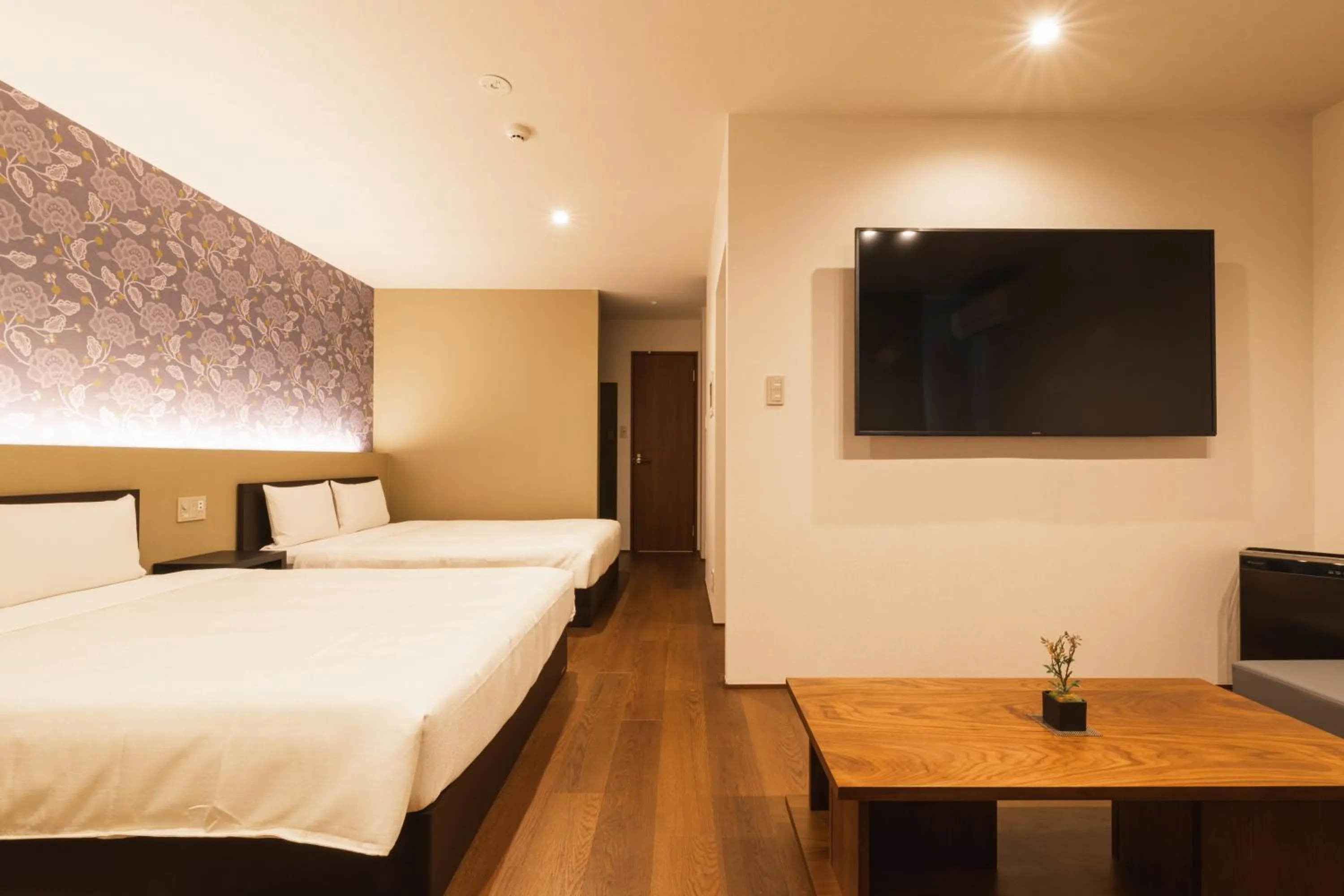 Photo of the whole room, Bed in GRAND BASE Hakata Gofuku