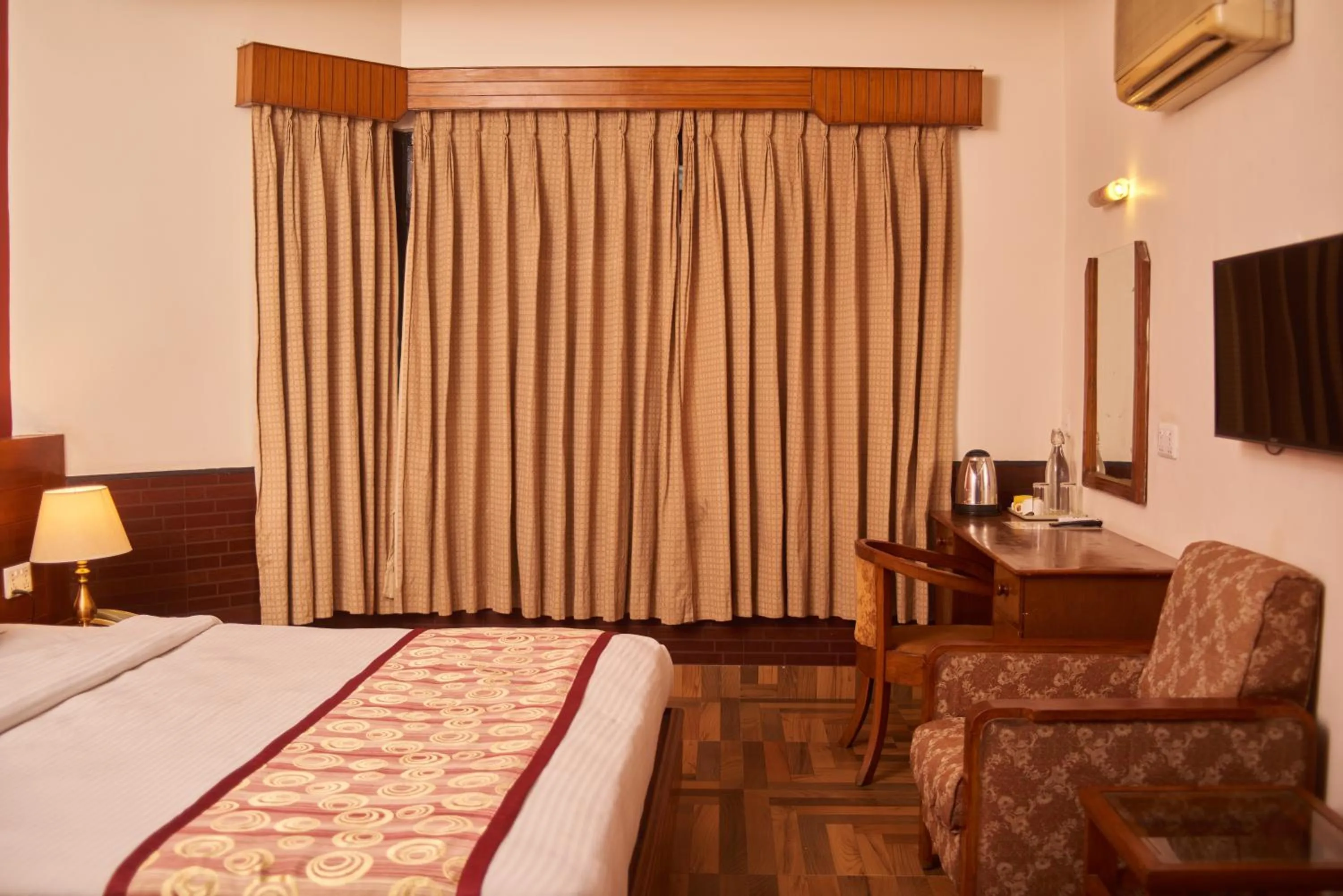 Bed in Hotel Tulsi