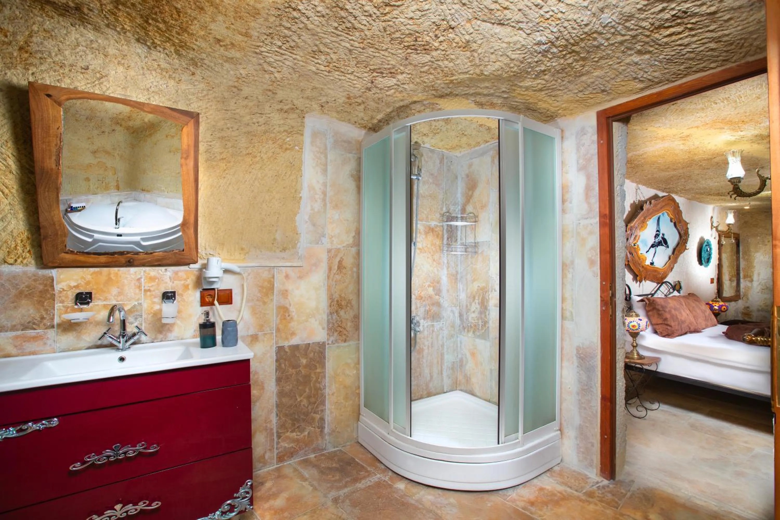 Shower, Bed in Romantic Cave Hotel