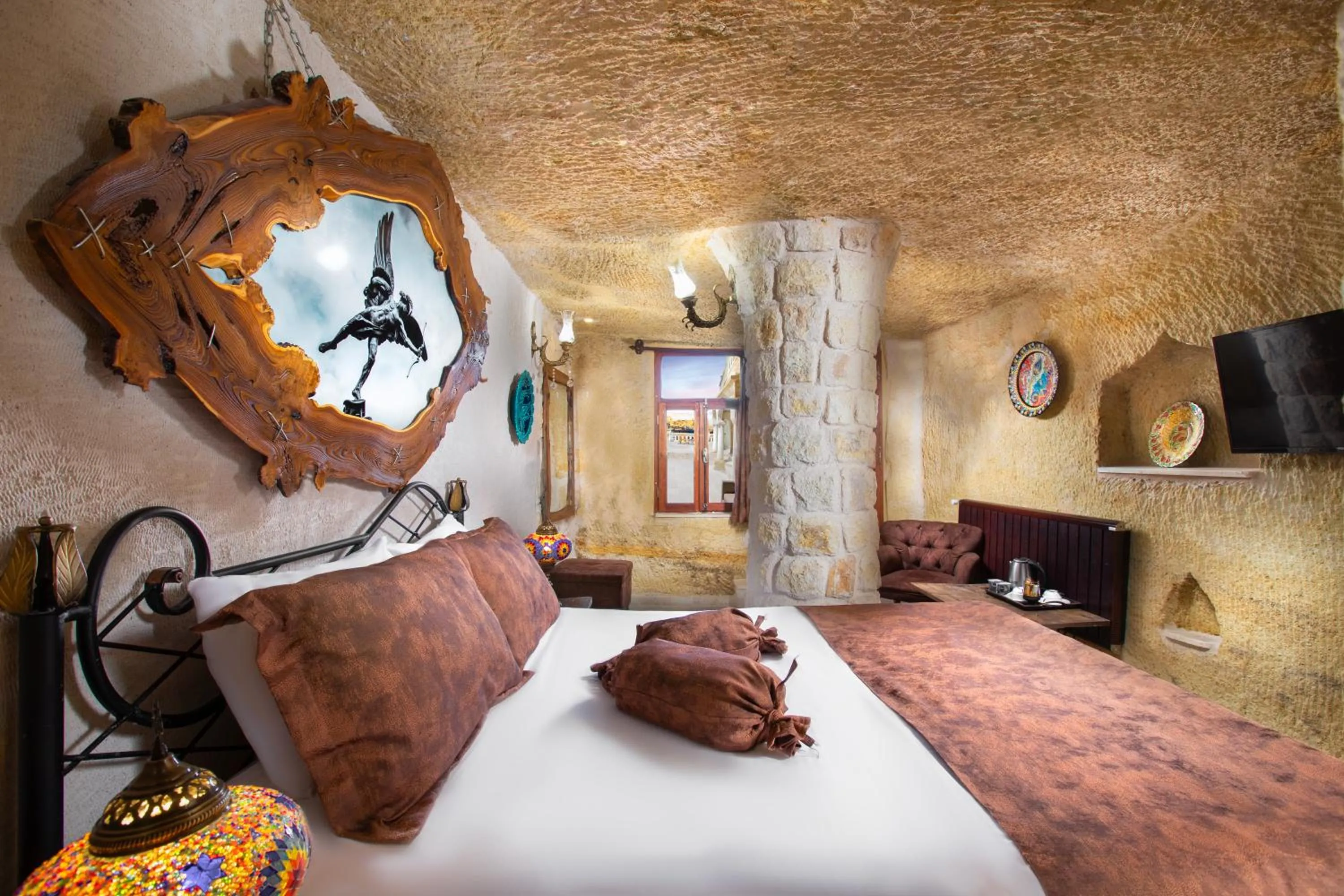 Bed in Romantic Cave Hotel