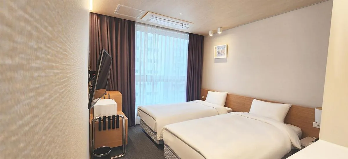 Bed in Grand City Hotel Changwon