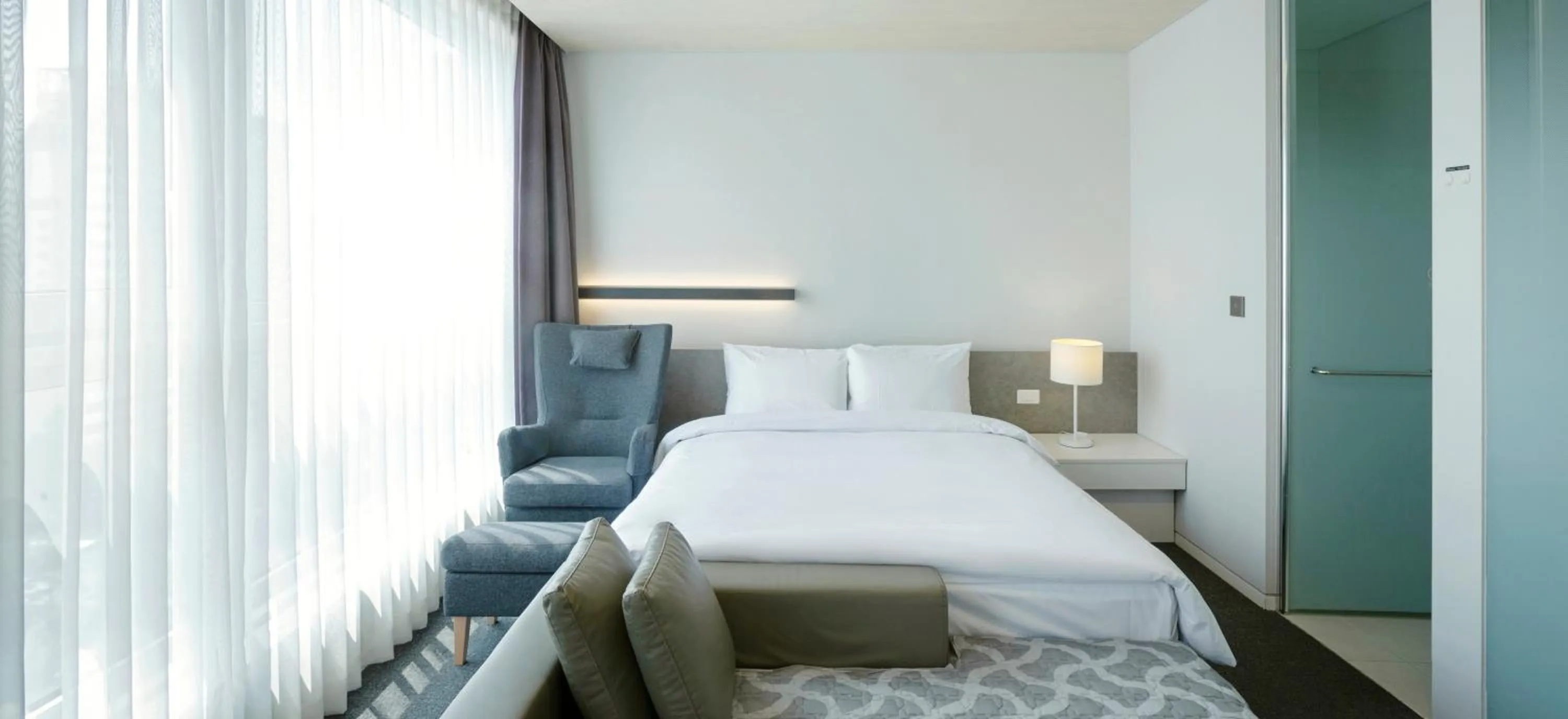 Bed in Grand City Hotel Changwon
