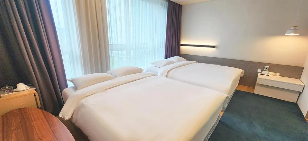 Bed in Grand City Hotel Changwon