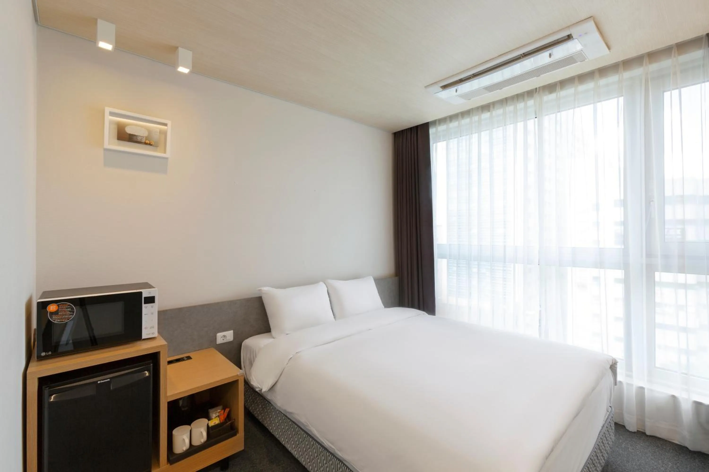 Bed in Grand City Hotel Changwon