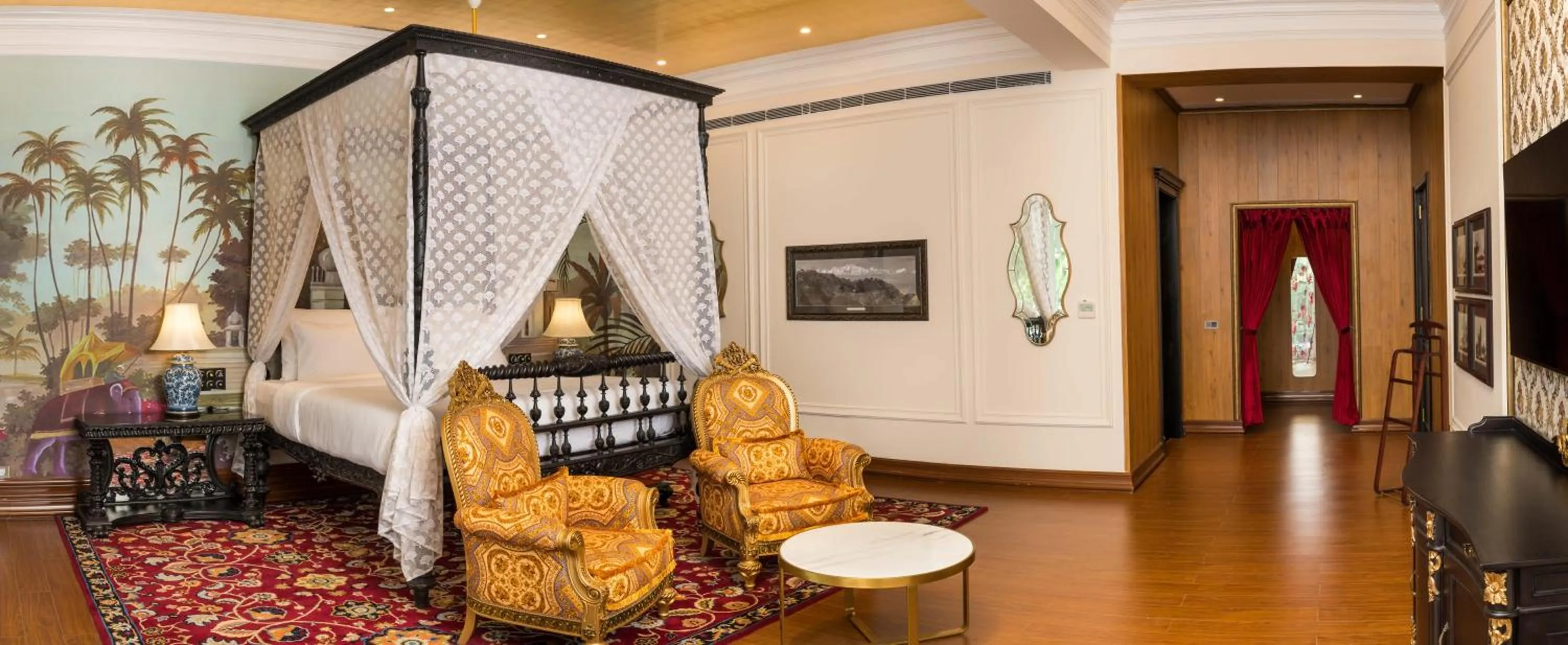 Communal lounge/ TV room, Bed in MAYFAIR Tea Resort