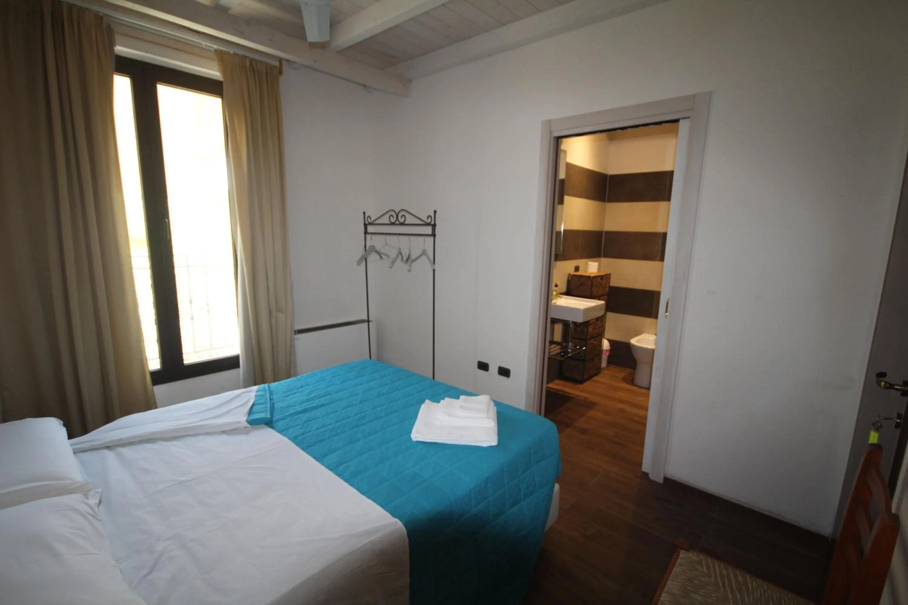 Bedroom in Villa La Conchiglia Rooms