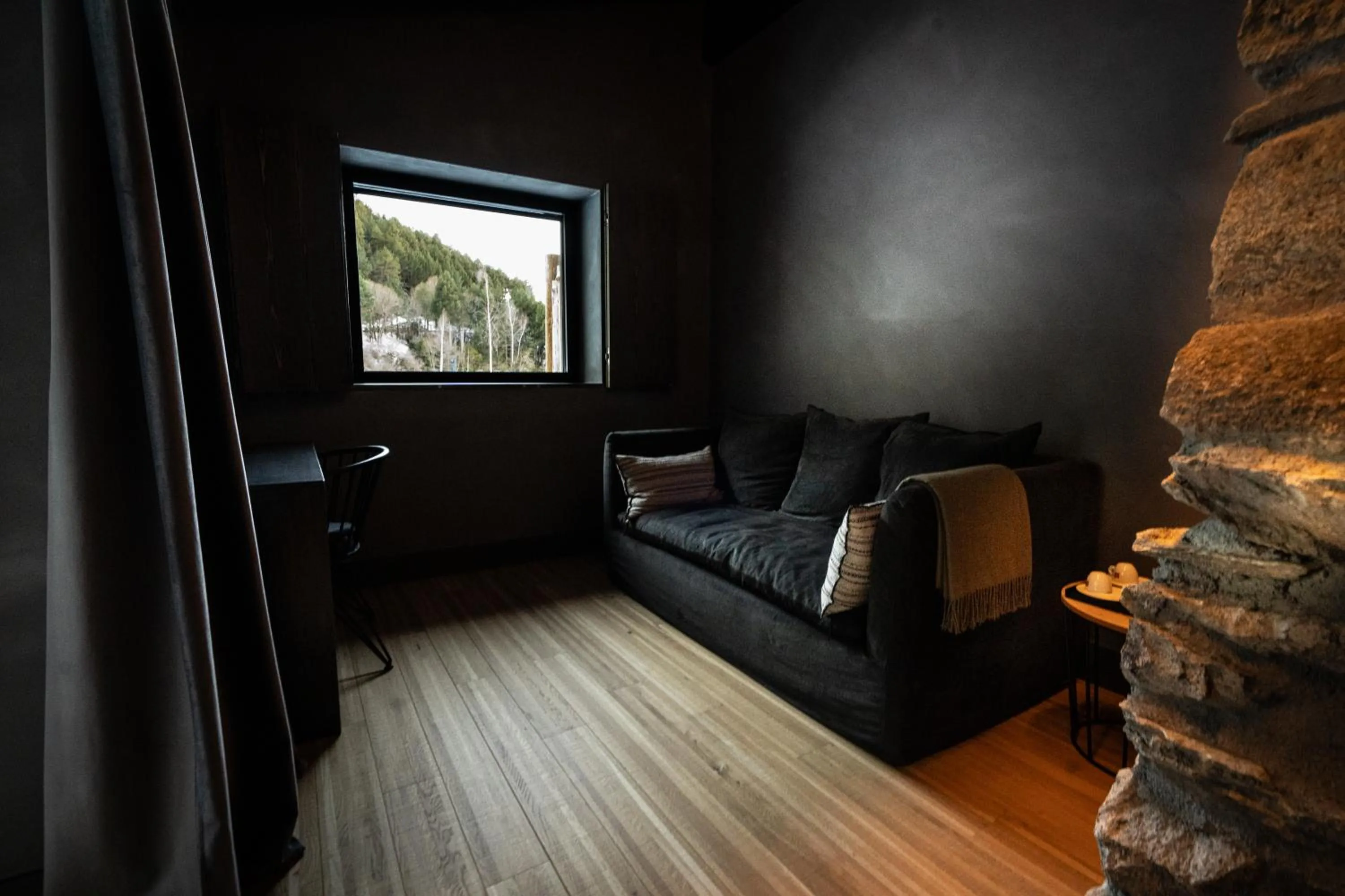 Seating area in Les Pardines 1819 Mountain suites & SPA