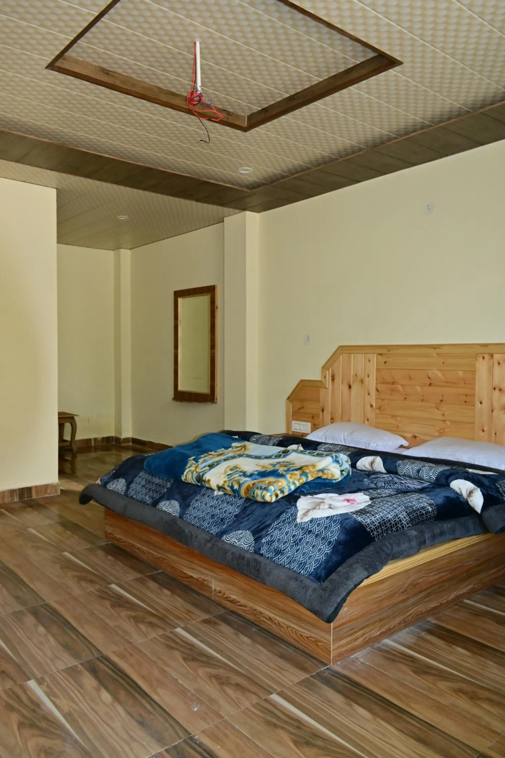 Bed in Nomadic Den Manali
