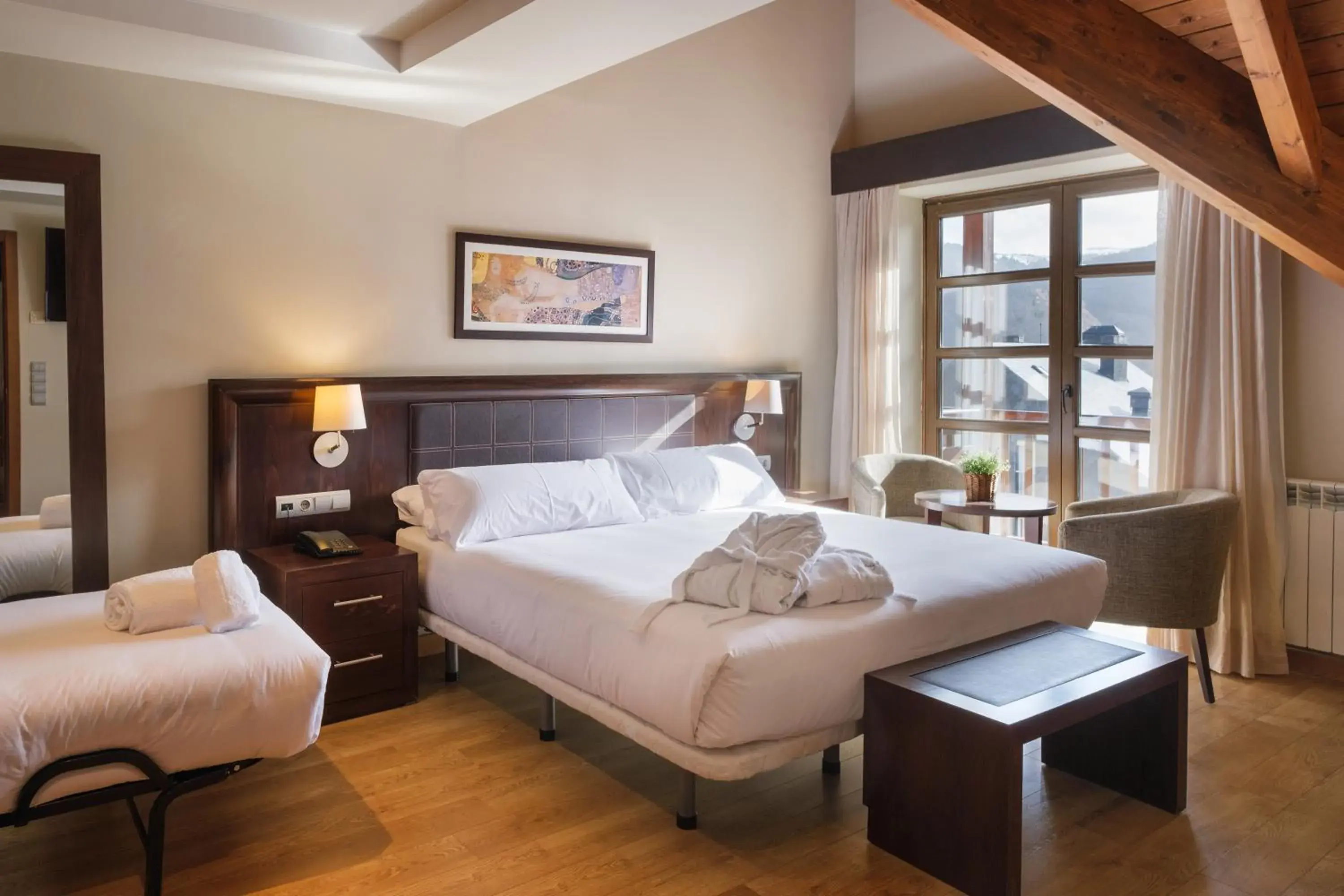 Deluxe Triple Room in Snö Aragon Hills Deluxe Triple Room in Snö Aragon Hills