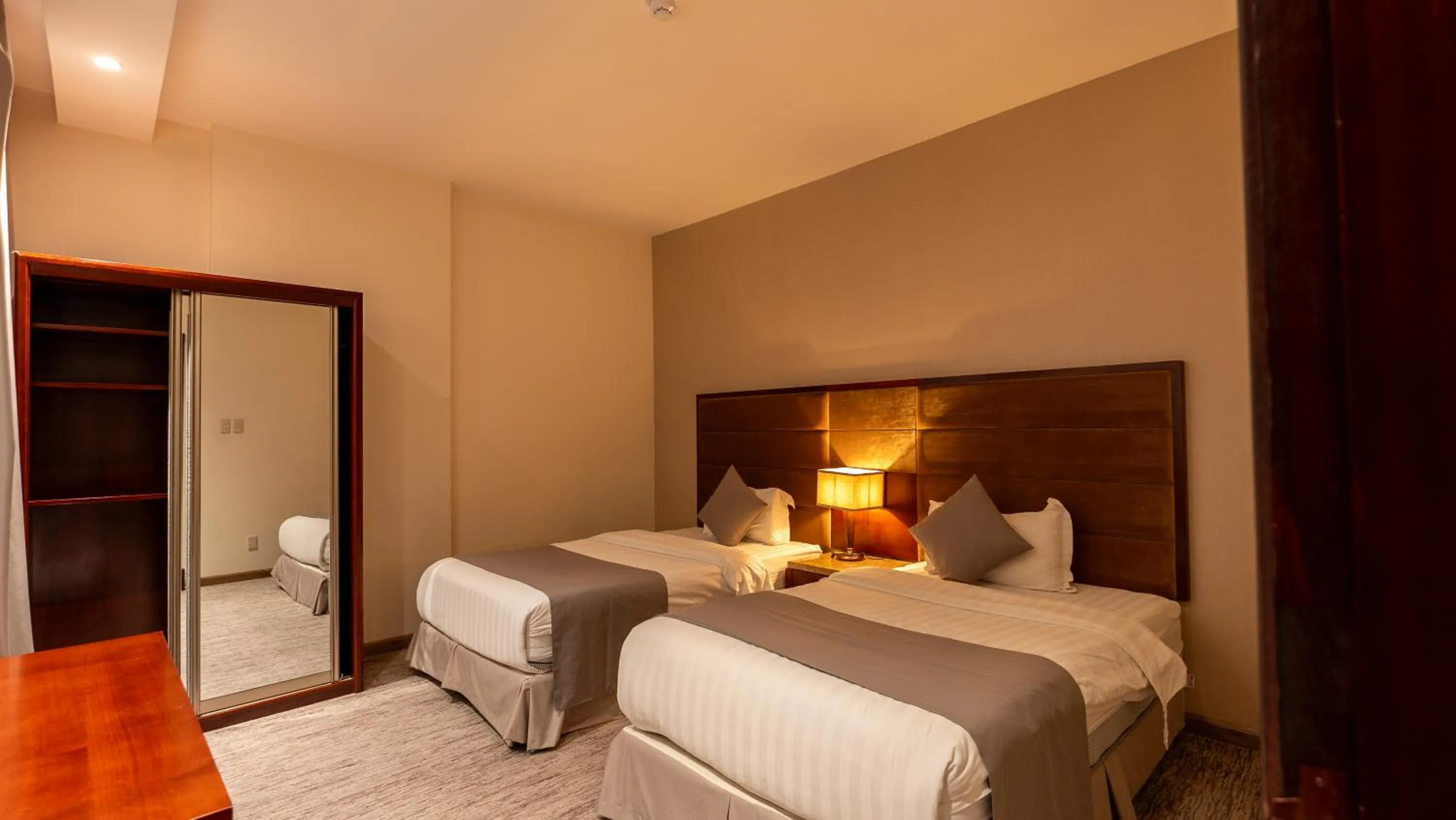 Bed in شقق مسكن المدينة للشقق المخدومة