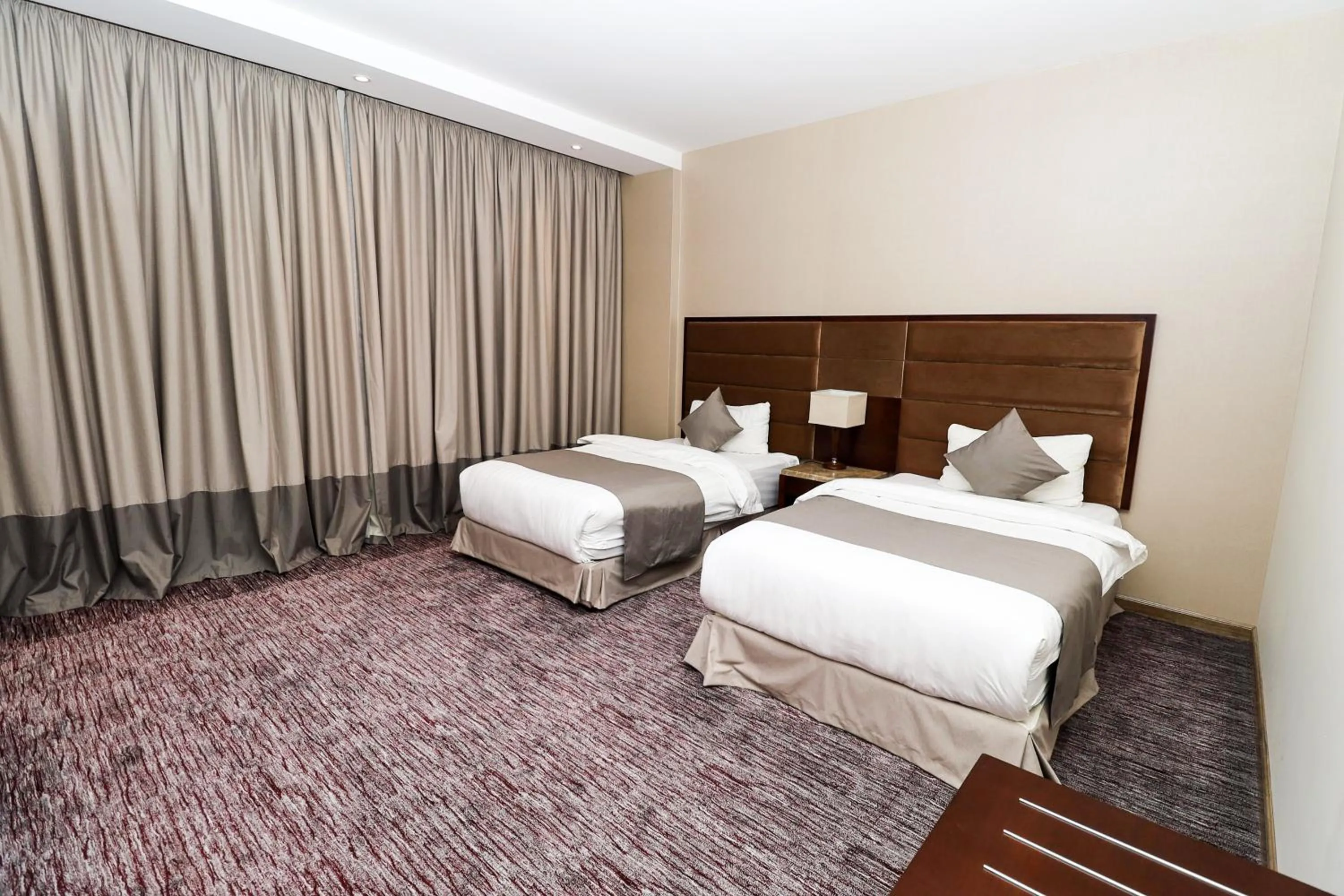 Bed in شقق مسكن المدينة للشقق المخدومة