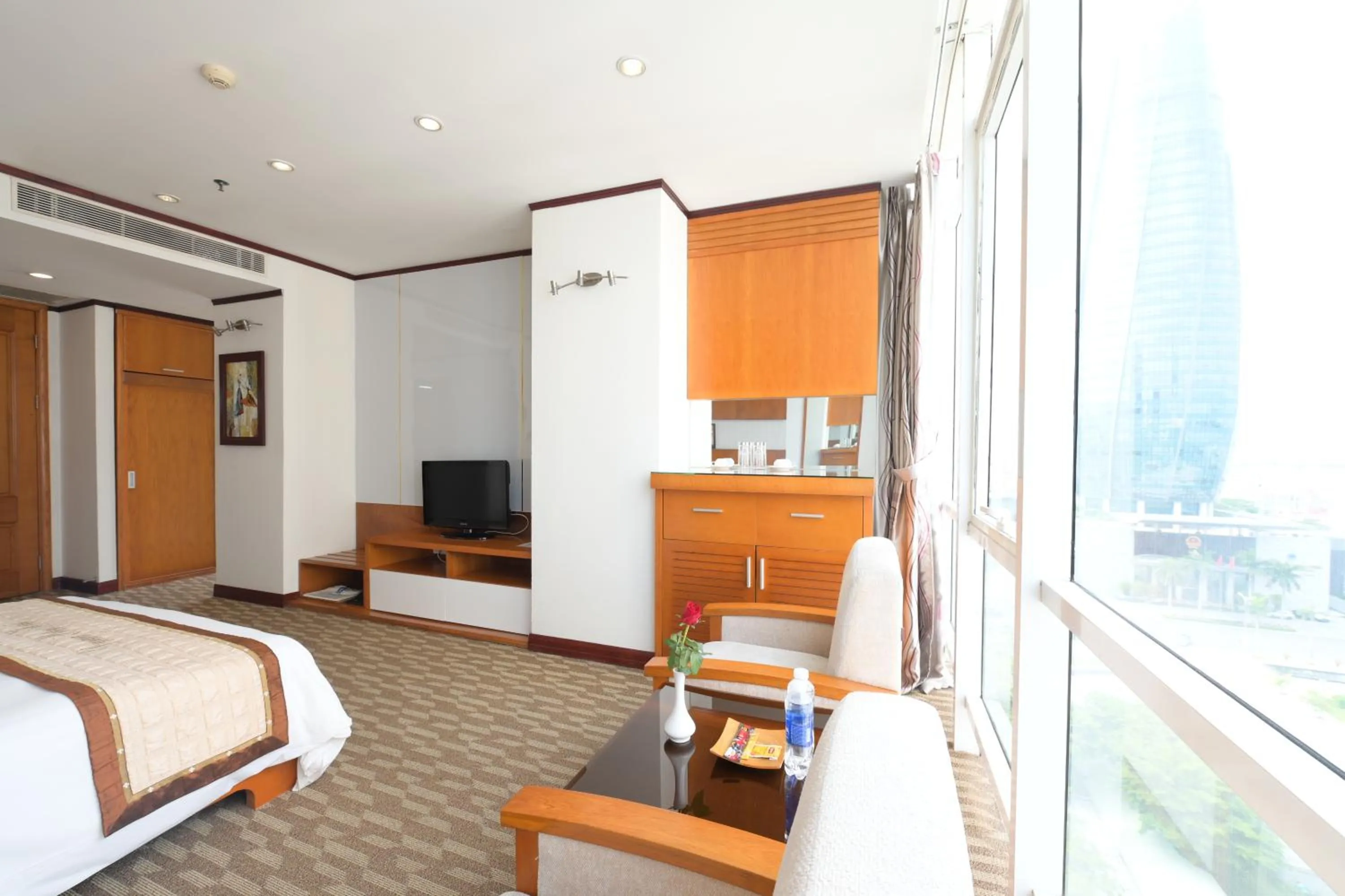 Living room, Bed in Danang Petro Hotel