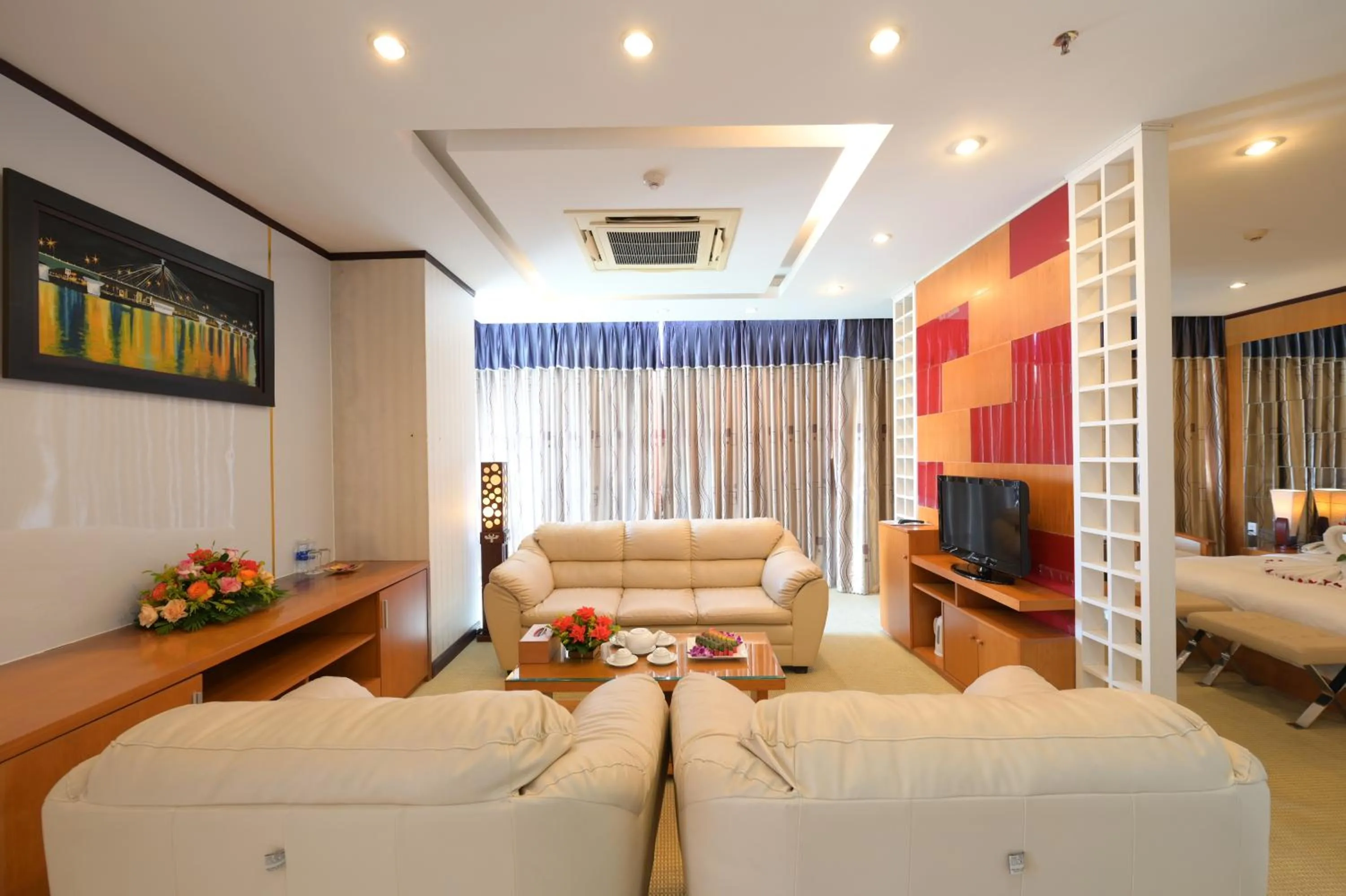 Living room, Bed in Danang Petro Hotel