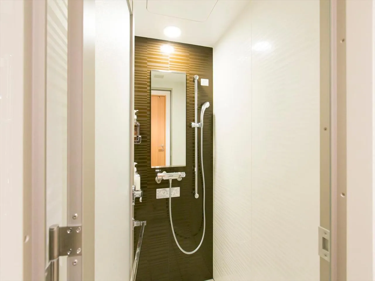 Shower in TORIFITO HOTEL&POD NISEKO