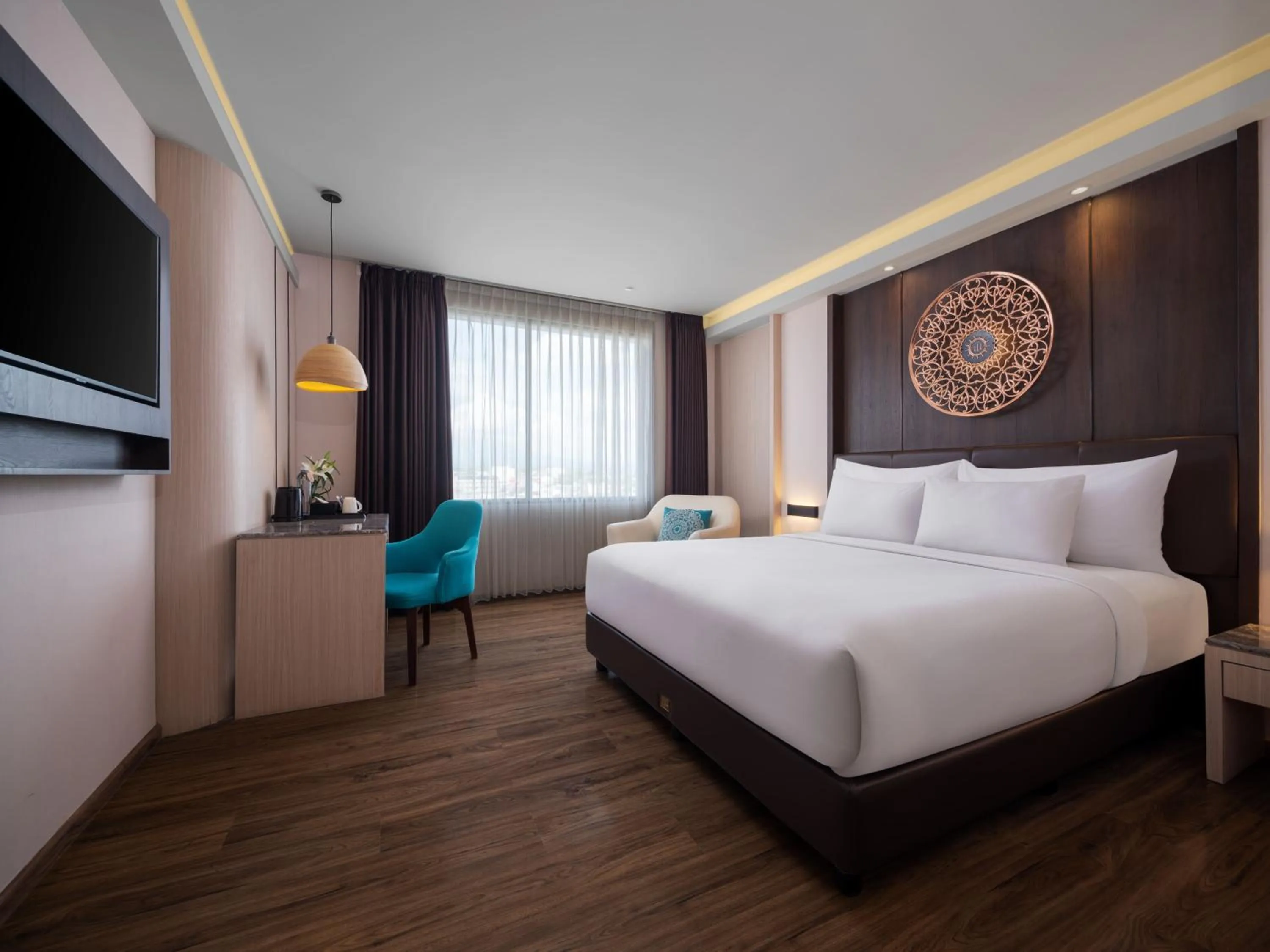 Bedroom, Bed in The Manohara Hotel Yogyakarta