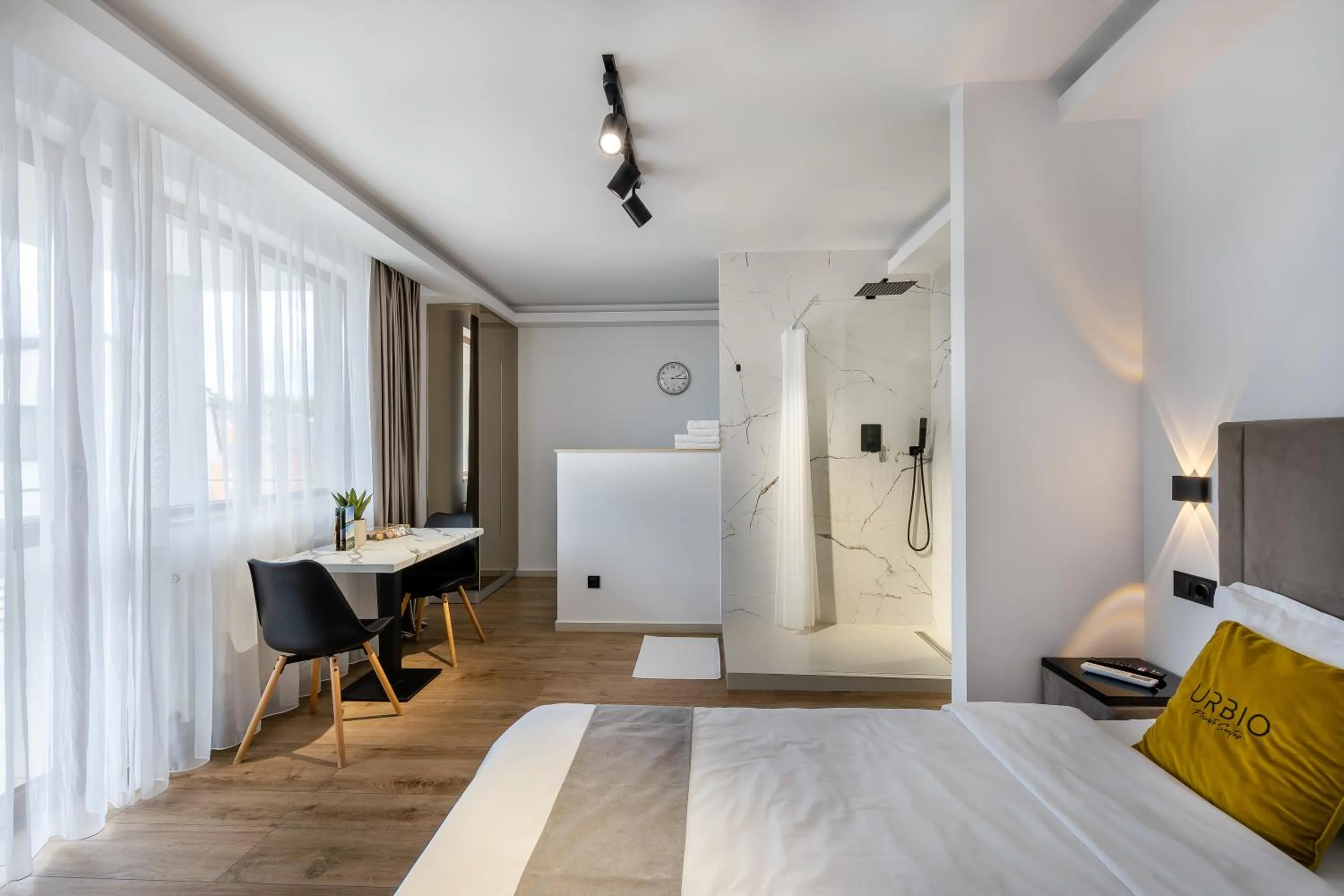 Shower, Bed in Urbio Private Suites