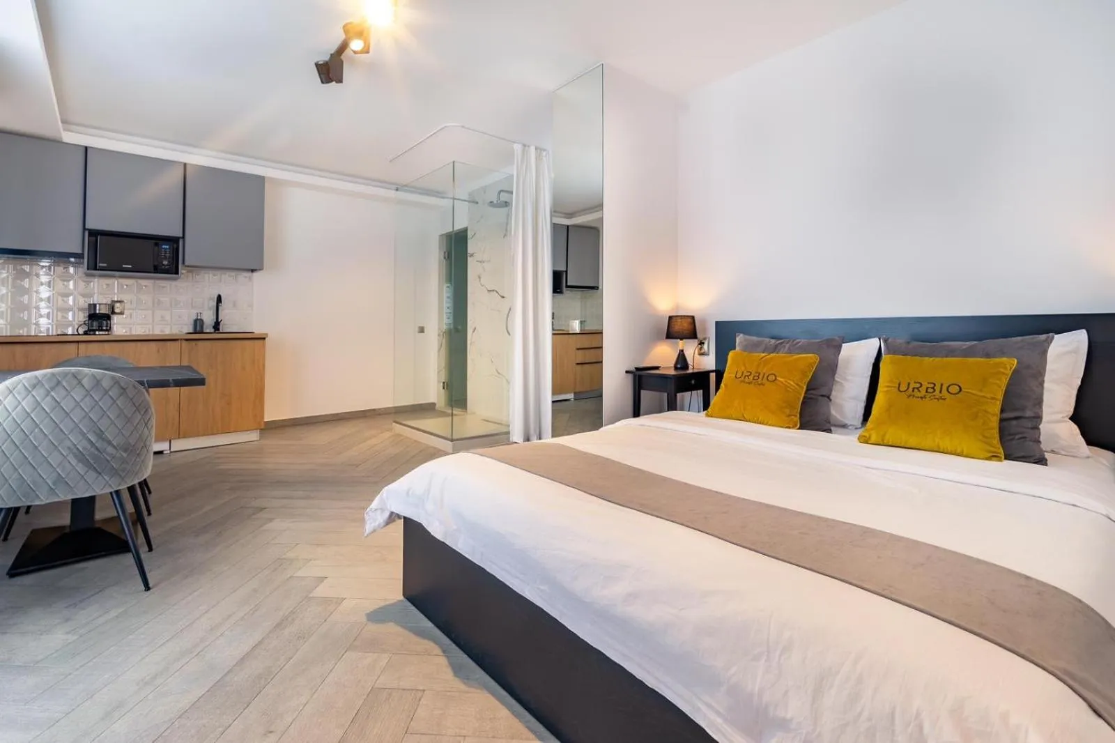 Shower, Bed in Urbio Private Suites