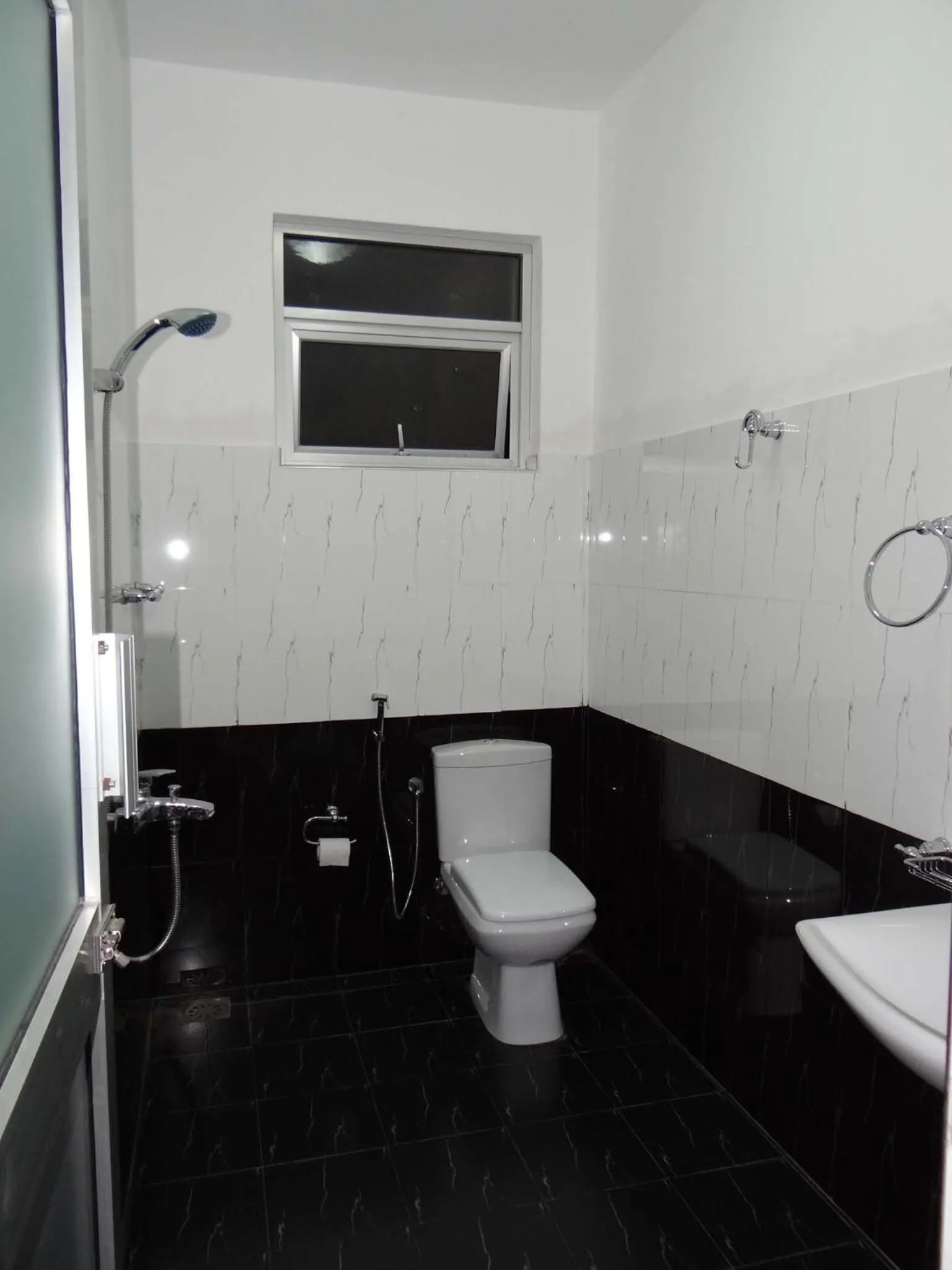 Bathroom in New Rani Inn