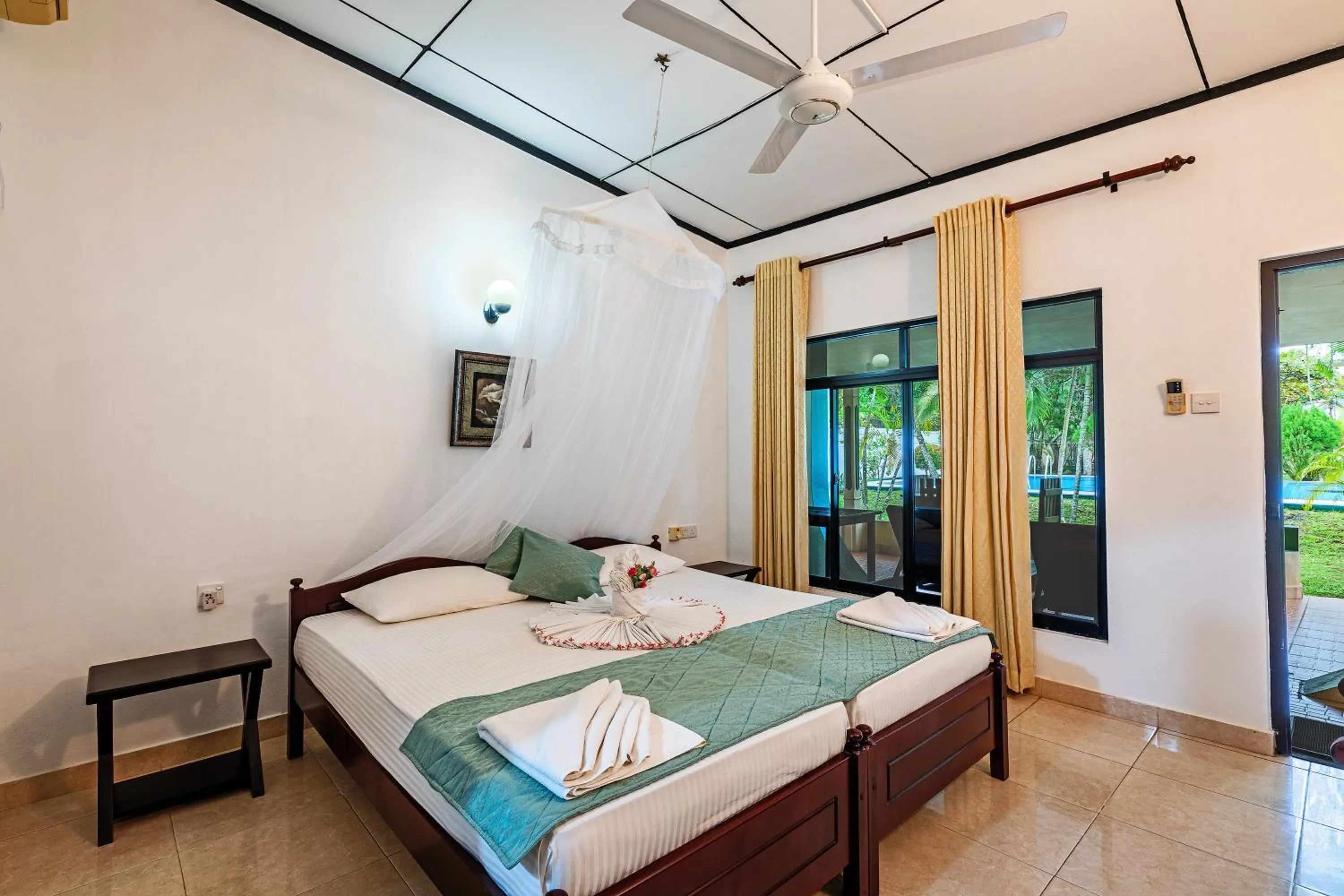 Photo of the whole room, Bed in Sagarika Beach Hotel