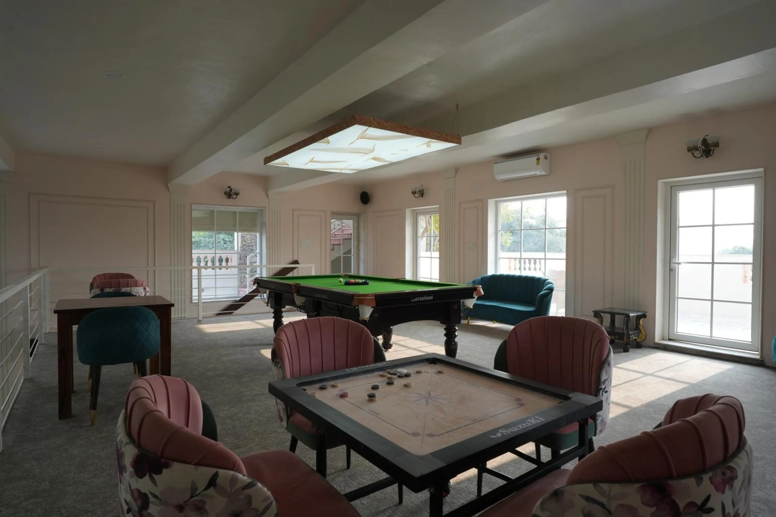 Lounge or bar in Astroport Sariska Treetop by Eight Continents