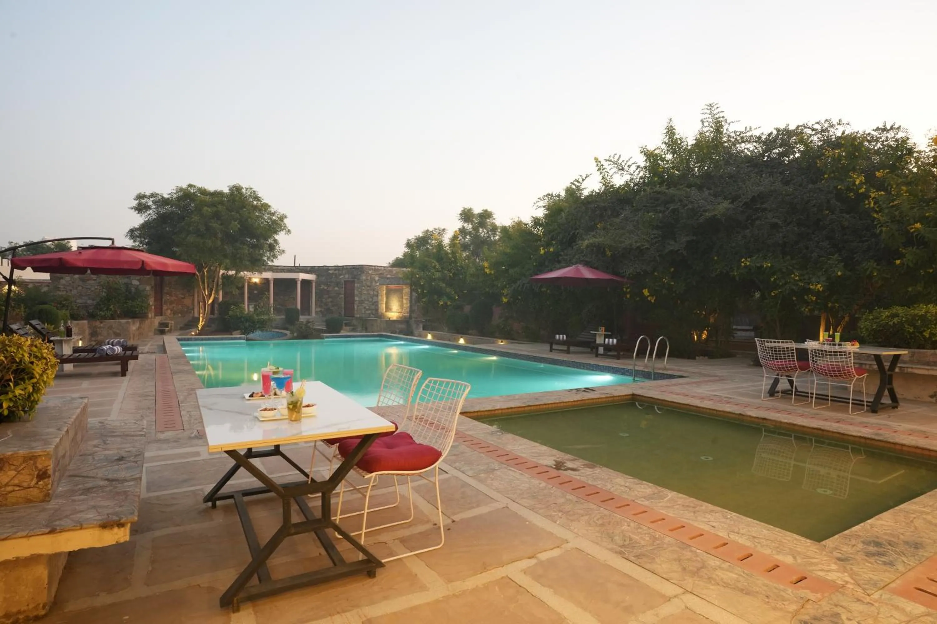 Swimming pool in Astroport Sariska Treetop by Eight Continents