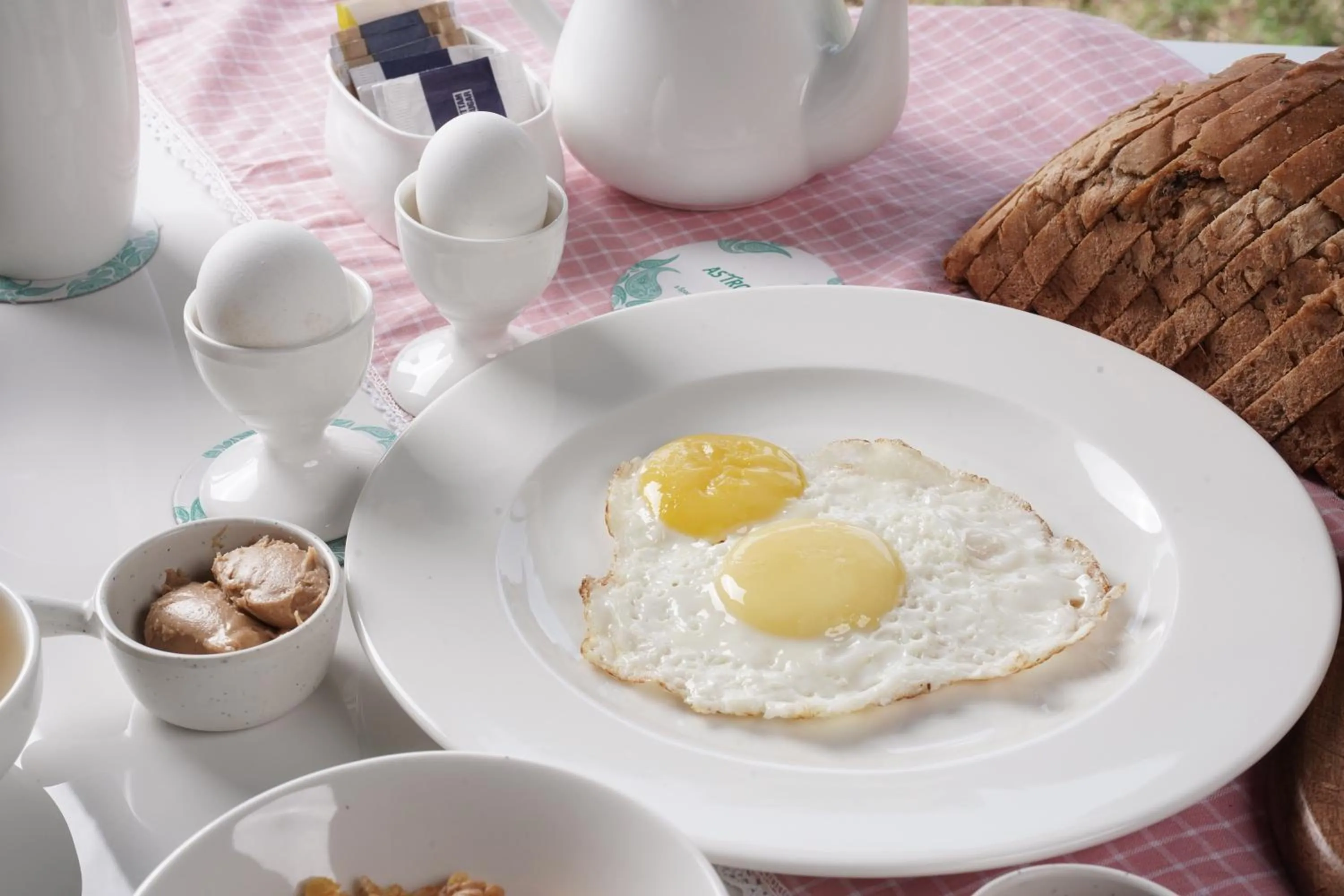 Dining area in Astroport Sariska Treetop by Eight Continents