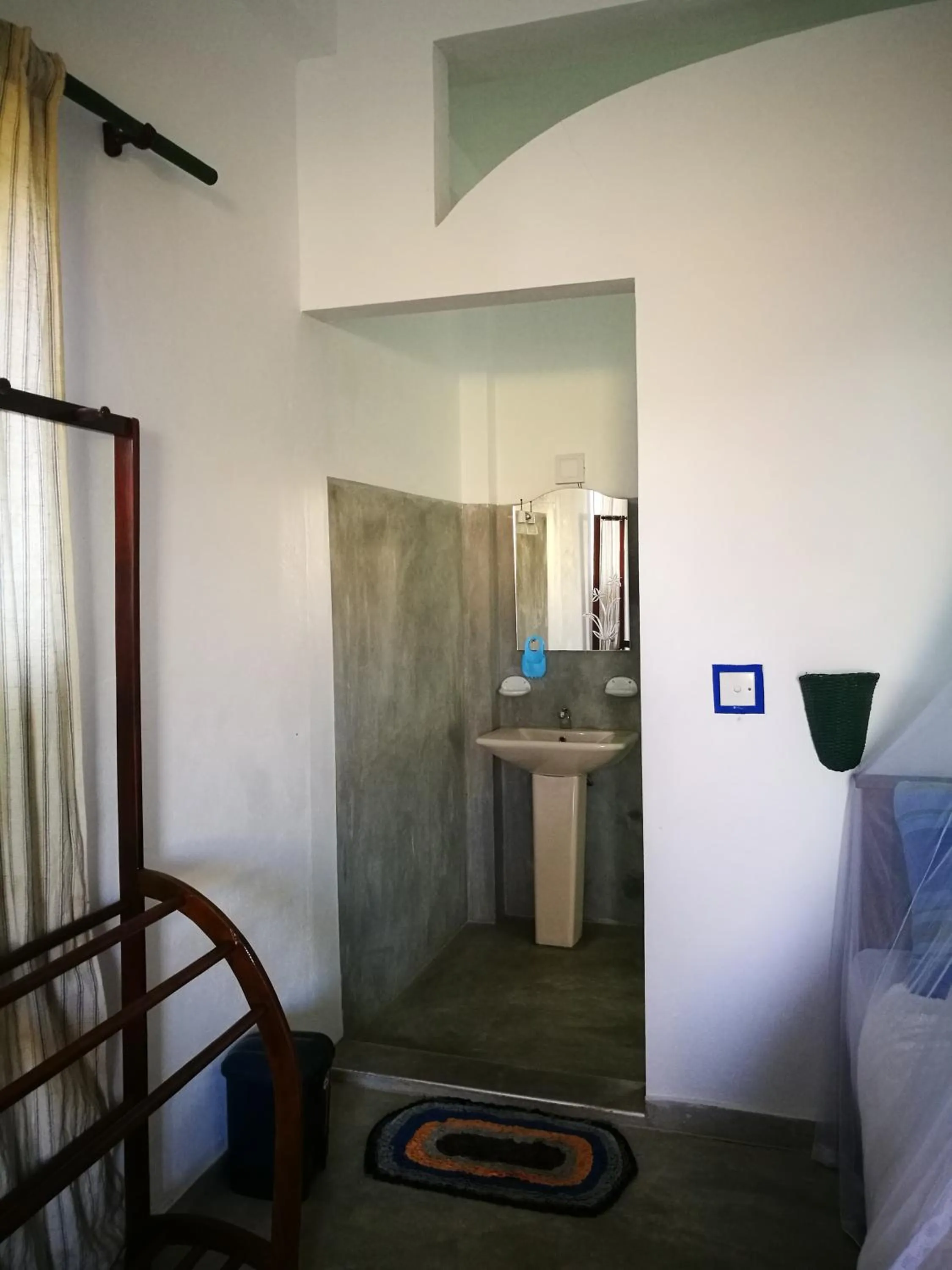 Bed in Frangipani Beach Villa