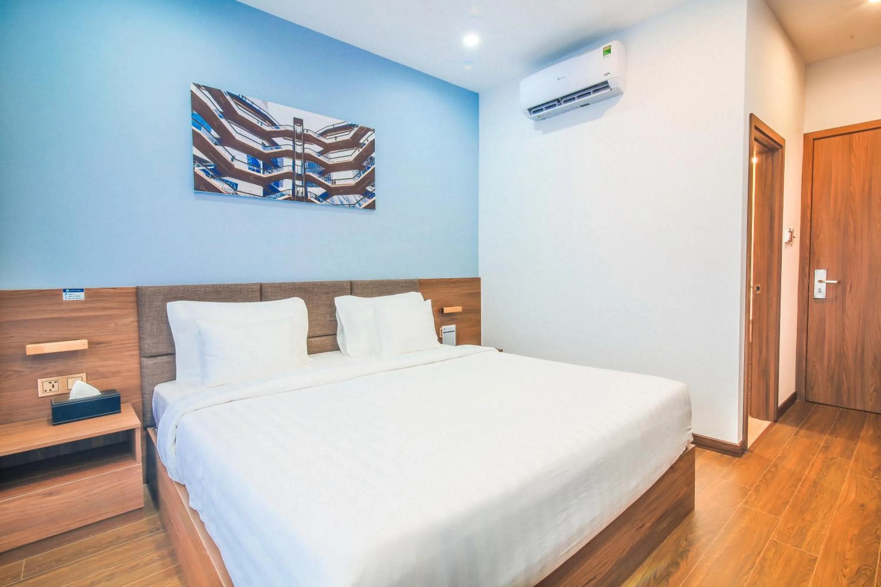 Bed in Grand Lee Hotel