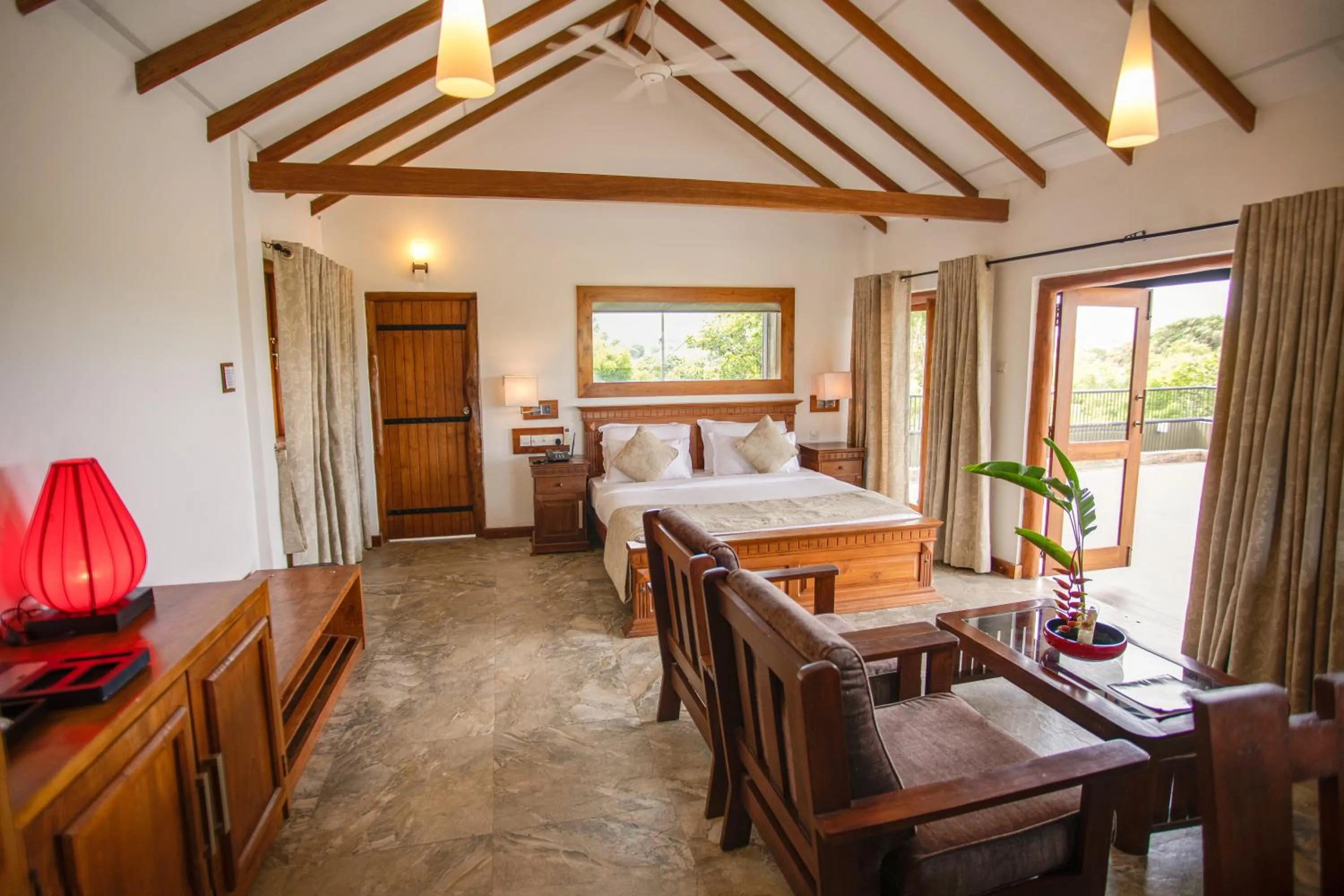 Seating area, Bed in Kalu's Hideaway Udawalawe
