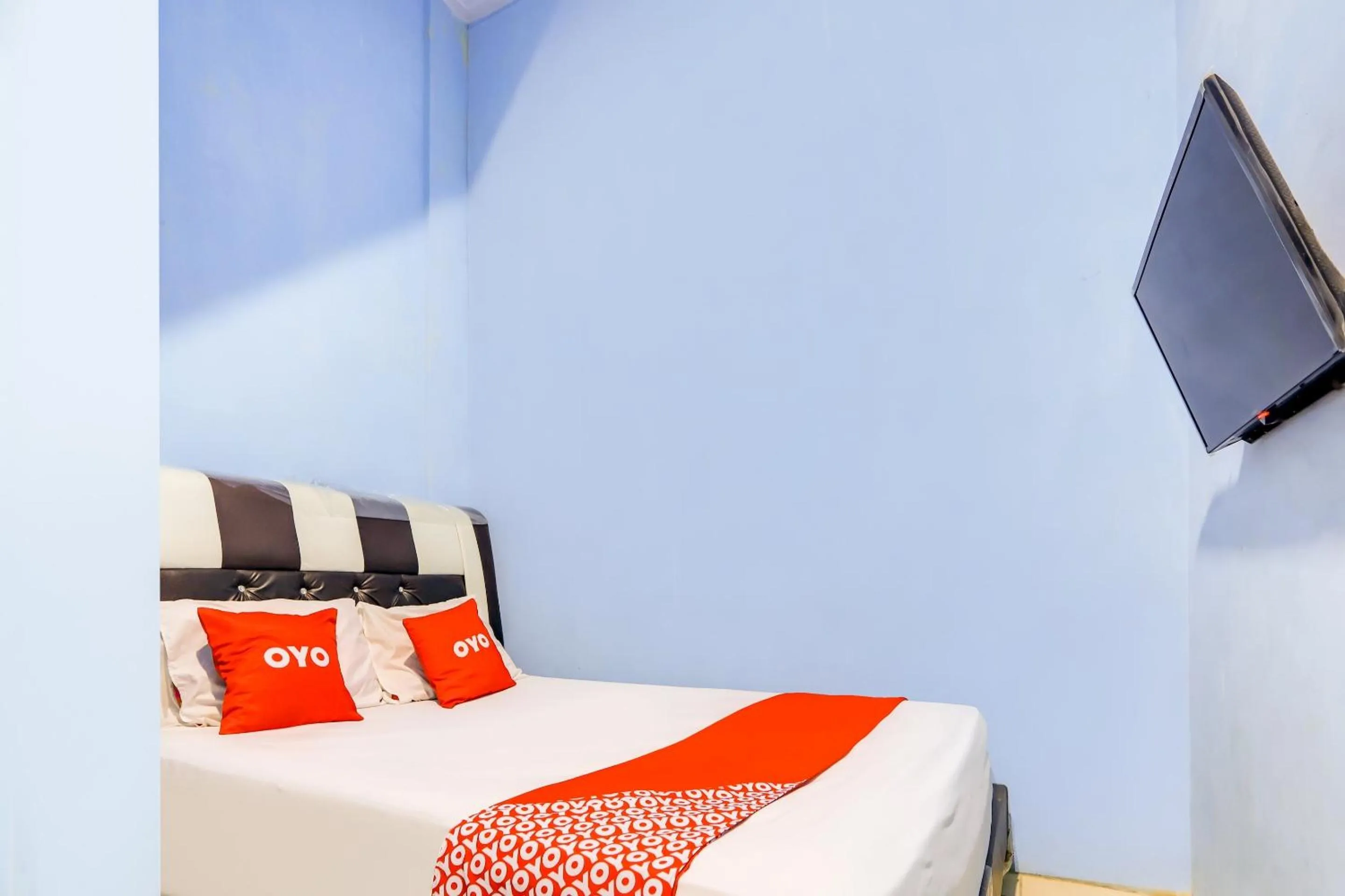 Bedroom, Bed in Hotel O Faster Inn 1