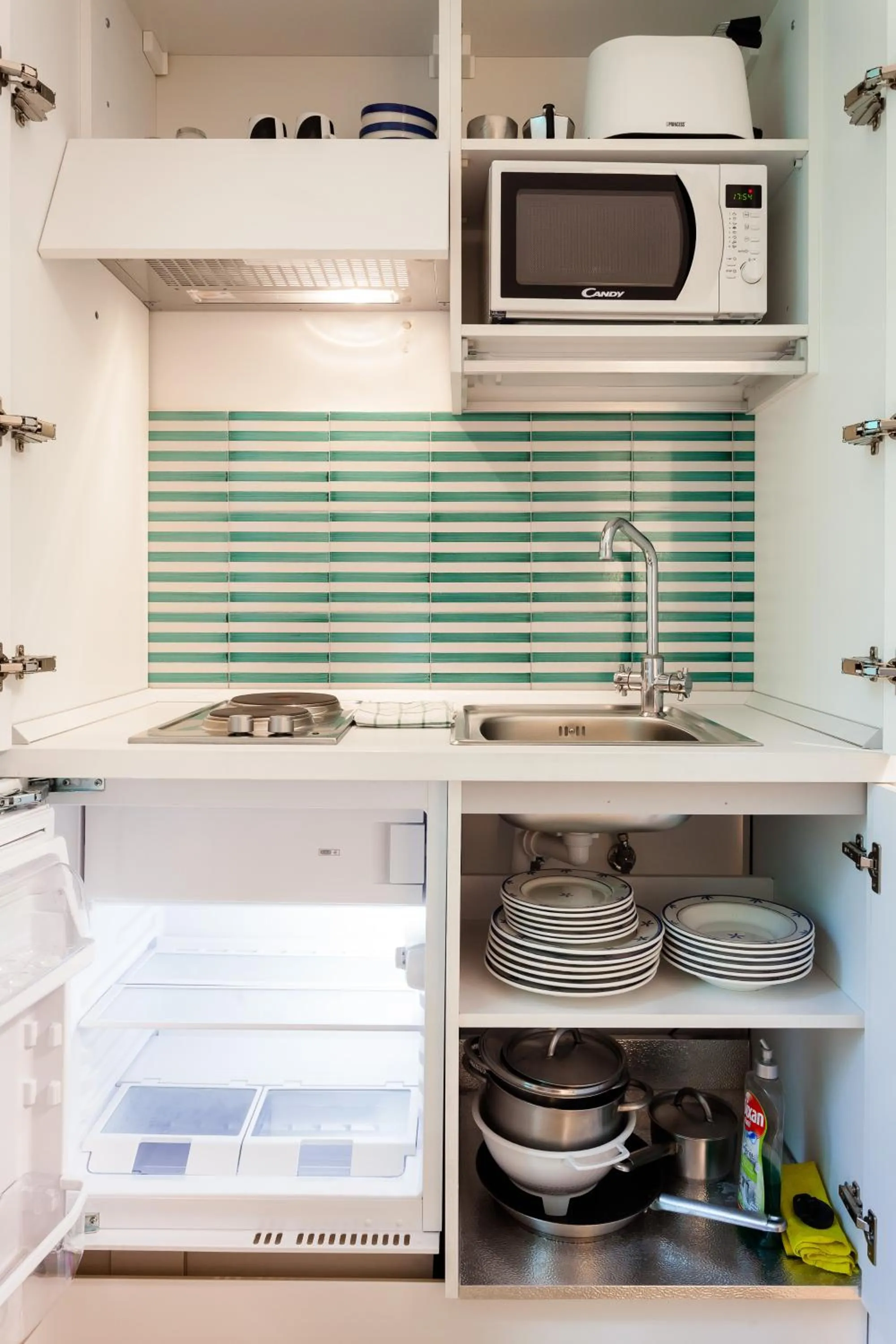 Kitchen or kitchenette in Corso Italia Suites