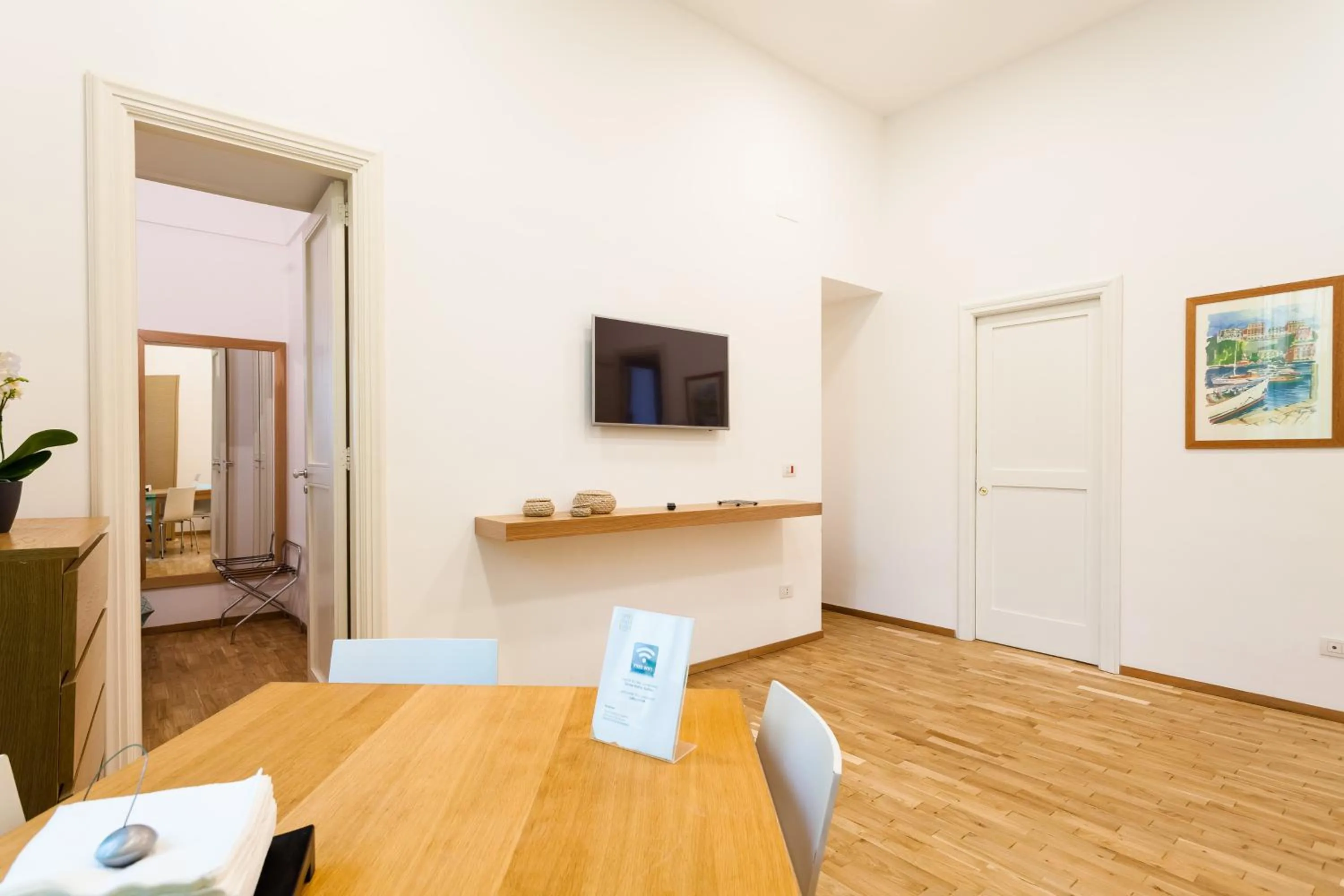 Photo of the whole room in Corso Italia Suites