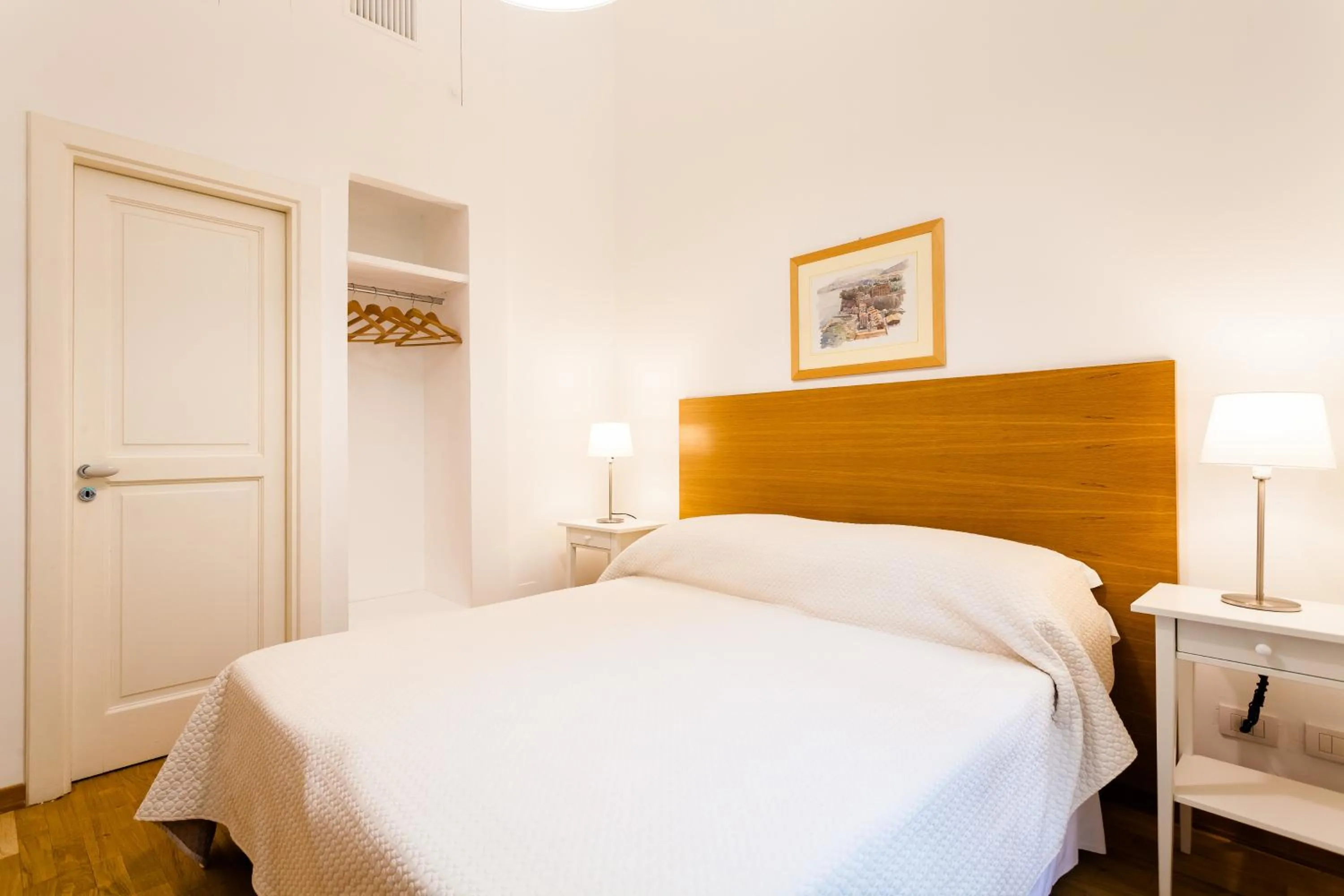 Bed in Corso Italia Suites
