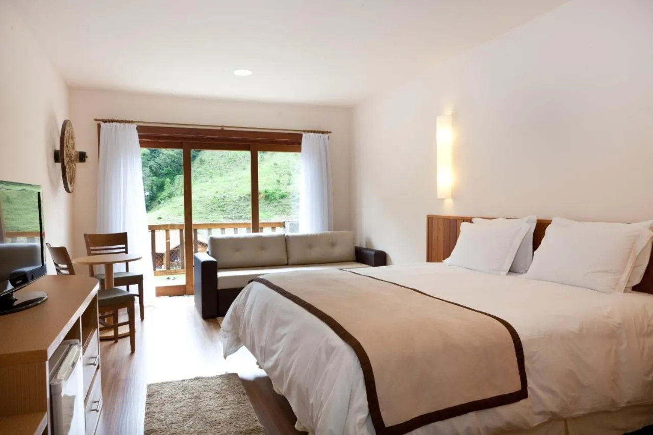 Bed in Fazenda Suica Le Canton