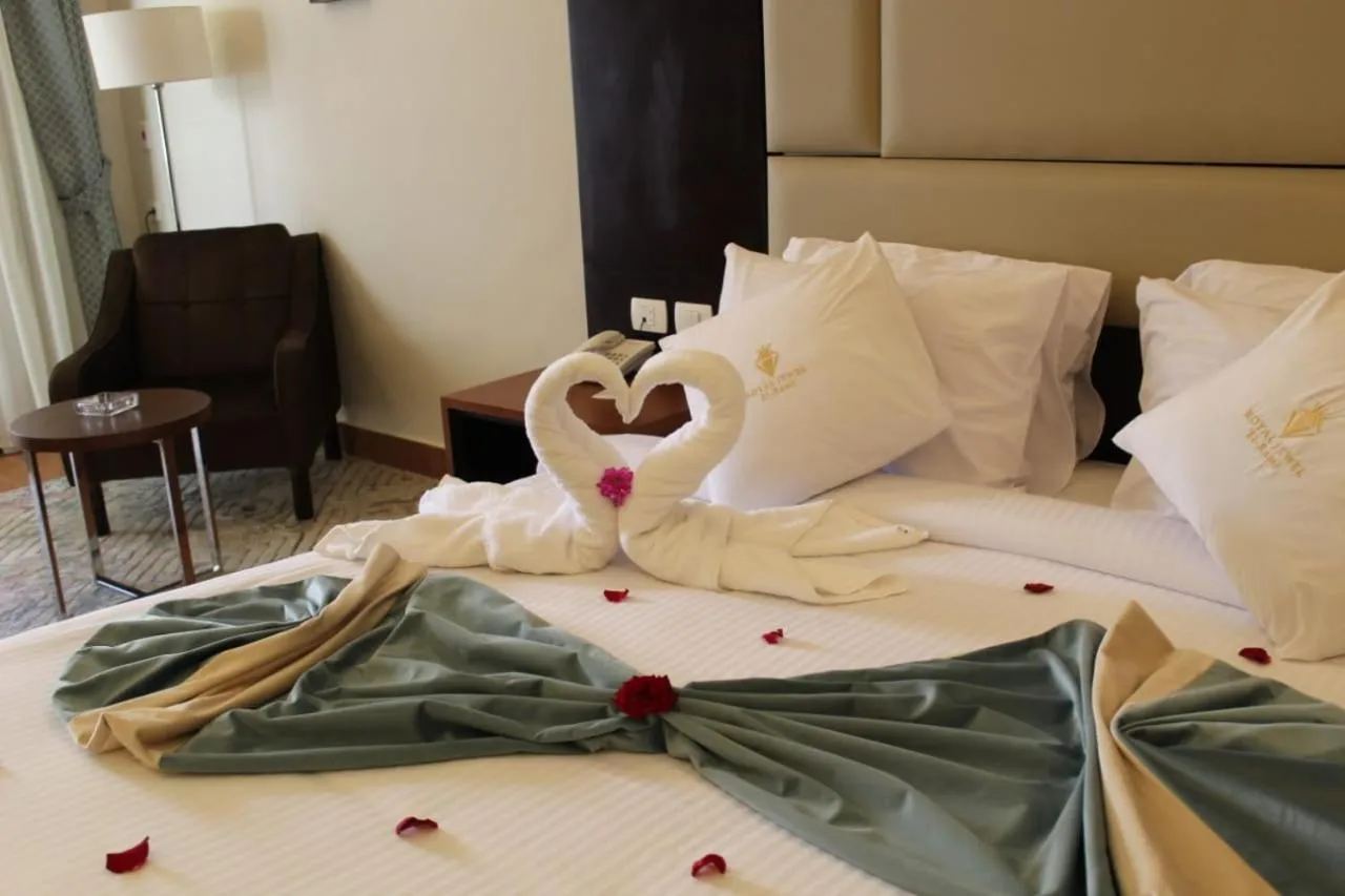Bed in Royal Jewel Al Raml Hotel