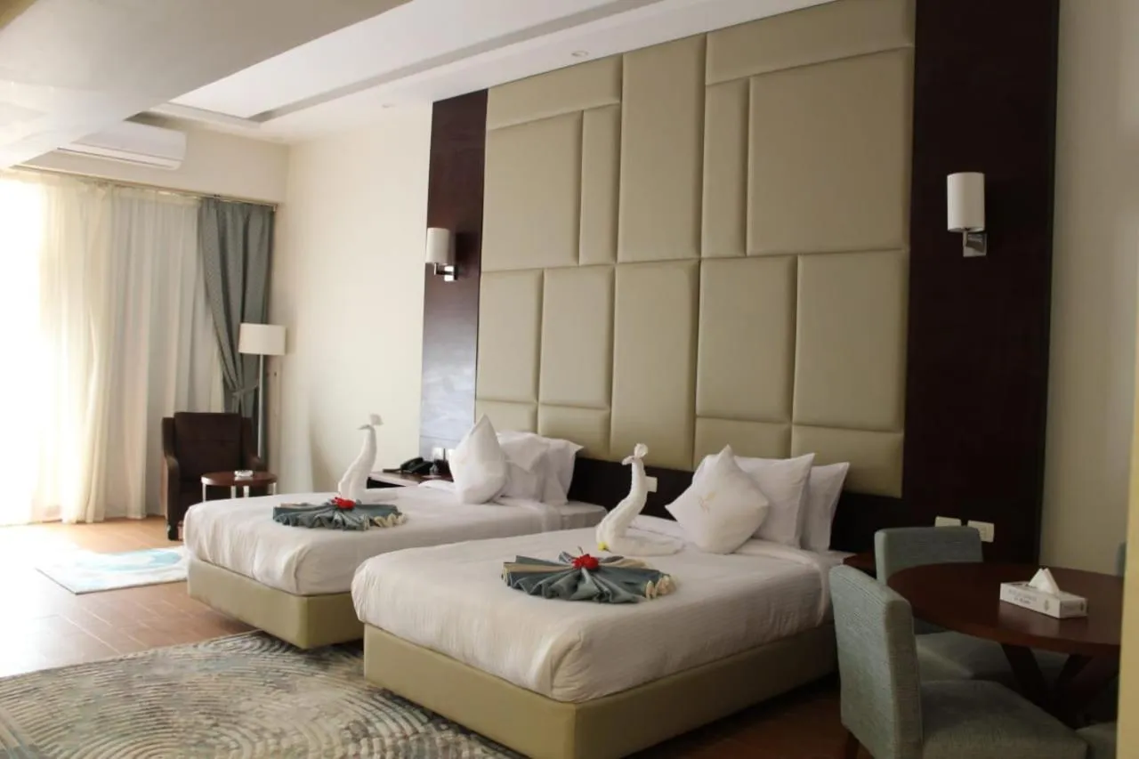 Bedroom, Bed in Royal Jewel Al Raml Hotel