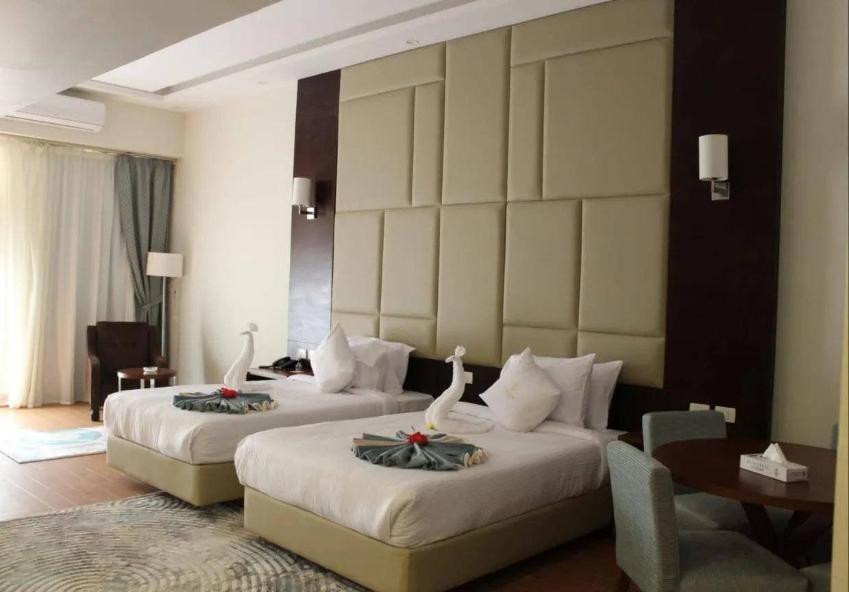 Bedroom, Bed in Royal Jewel Al Raml Hotel