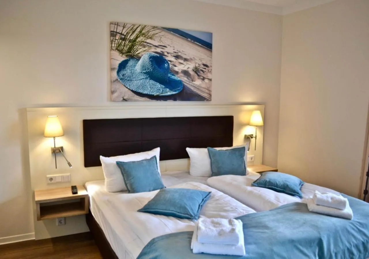 Bedroom in Aparthotel Waterkant Suites - Fewos am Meer mit SPA