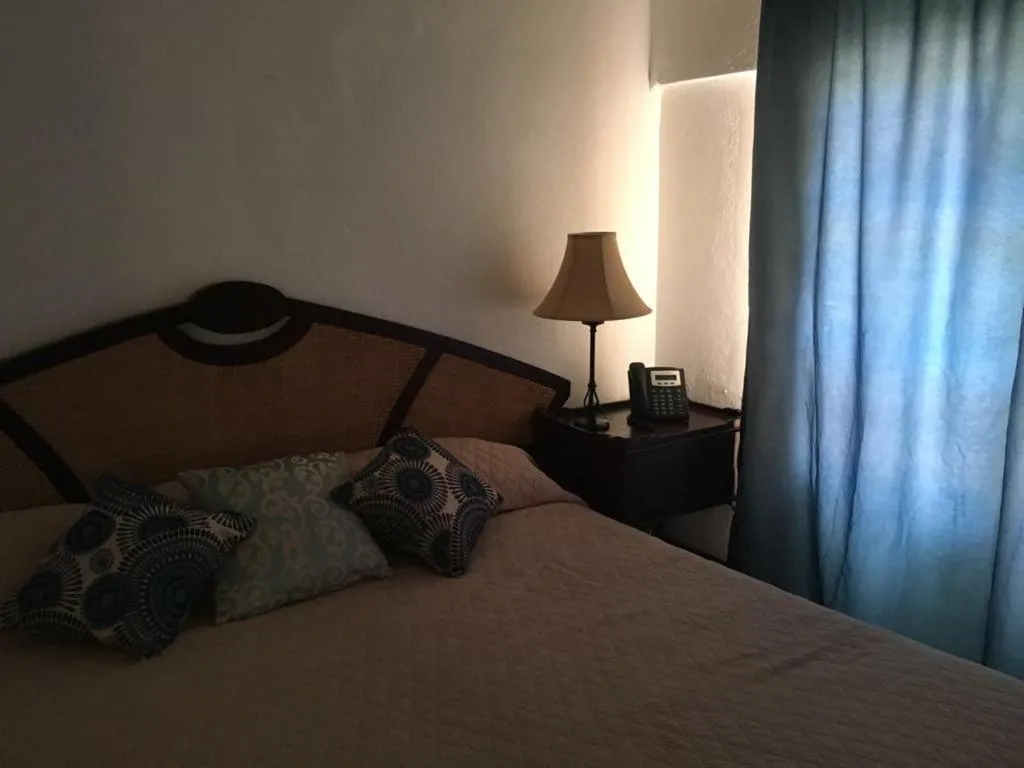 Bed in Paradise Beach Hotel