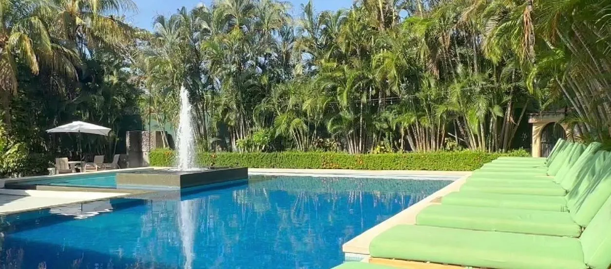 Swimming pool in The Palms At Coco Beach