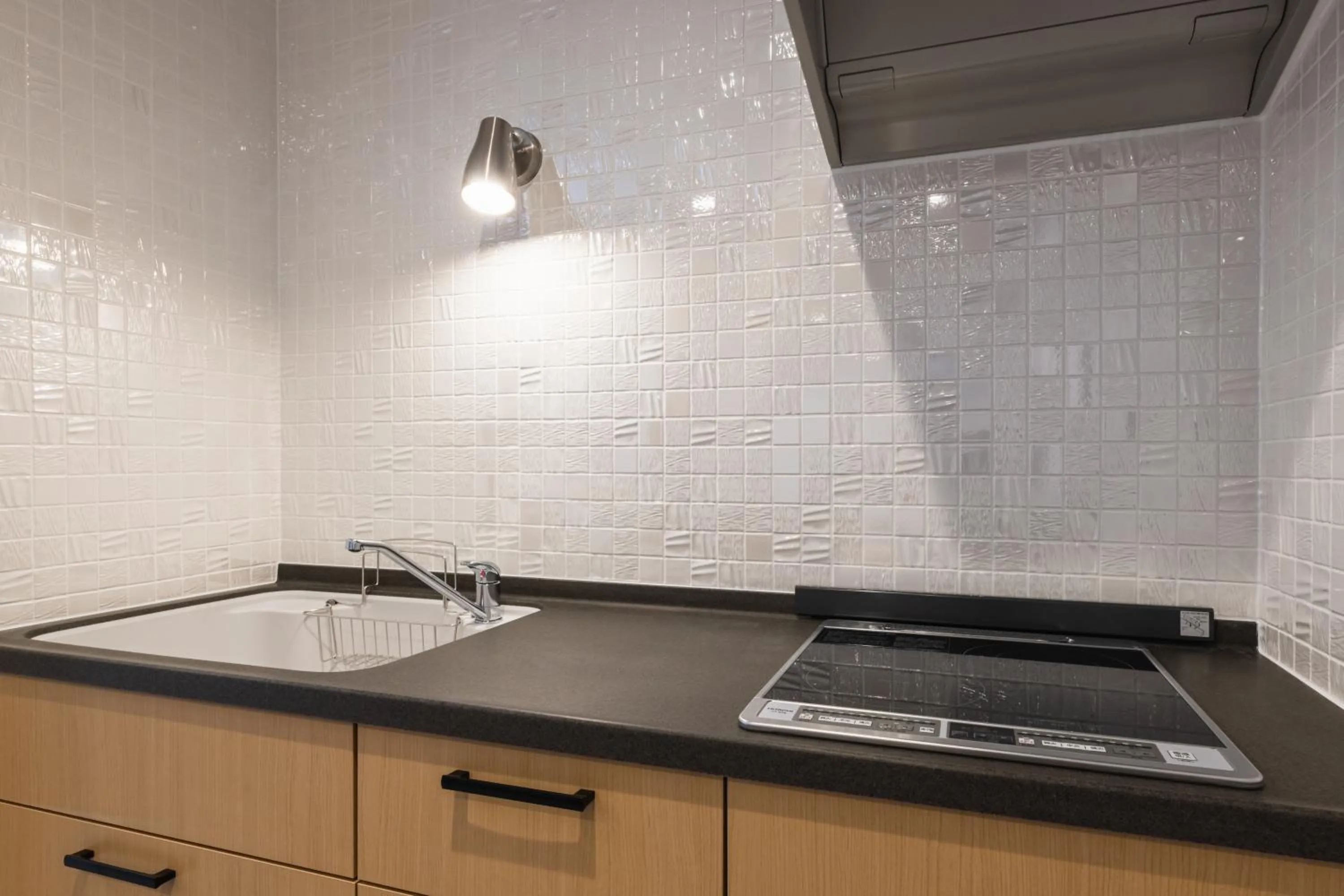 Kitchen or kitchenette in J-STAY Beppu indigo