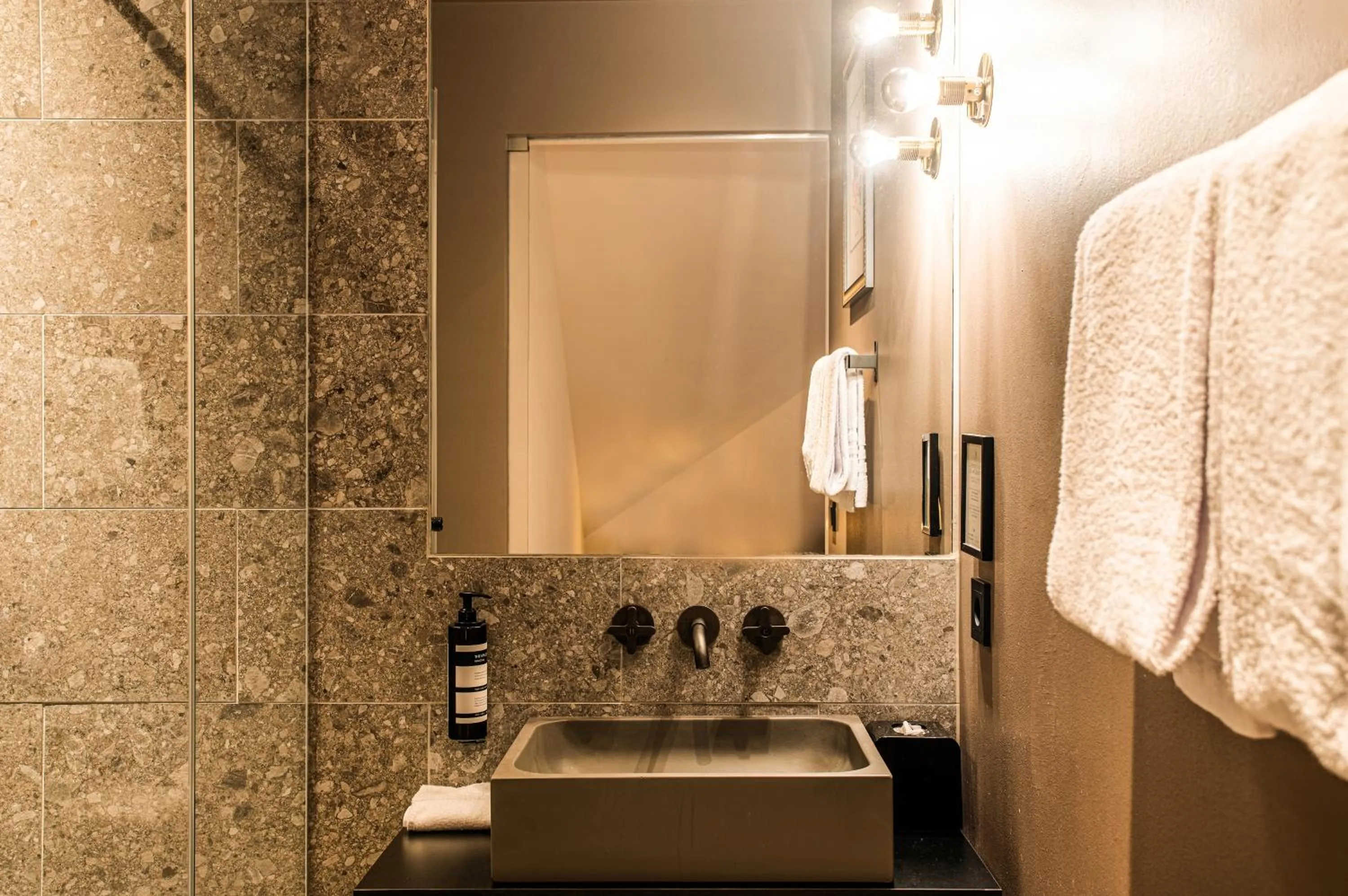 Bathroom in MIANO Hotel & Bar